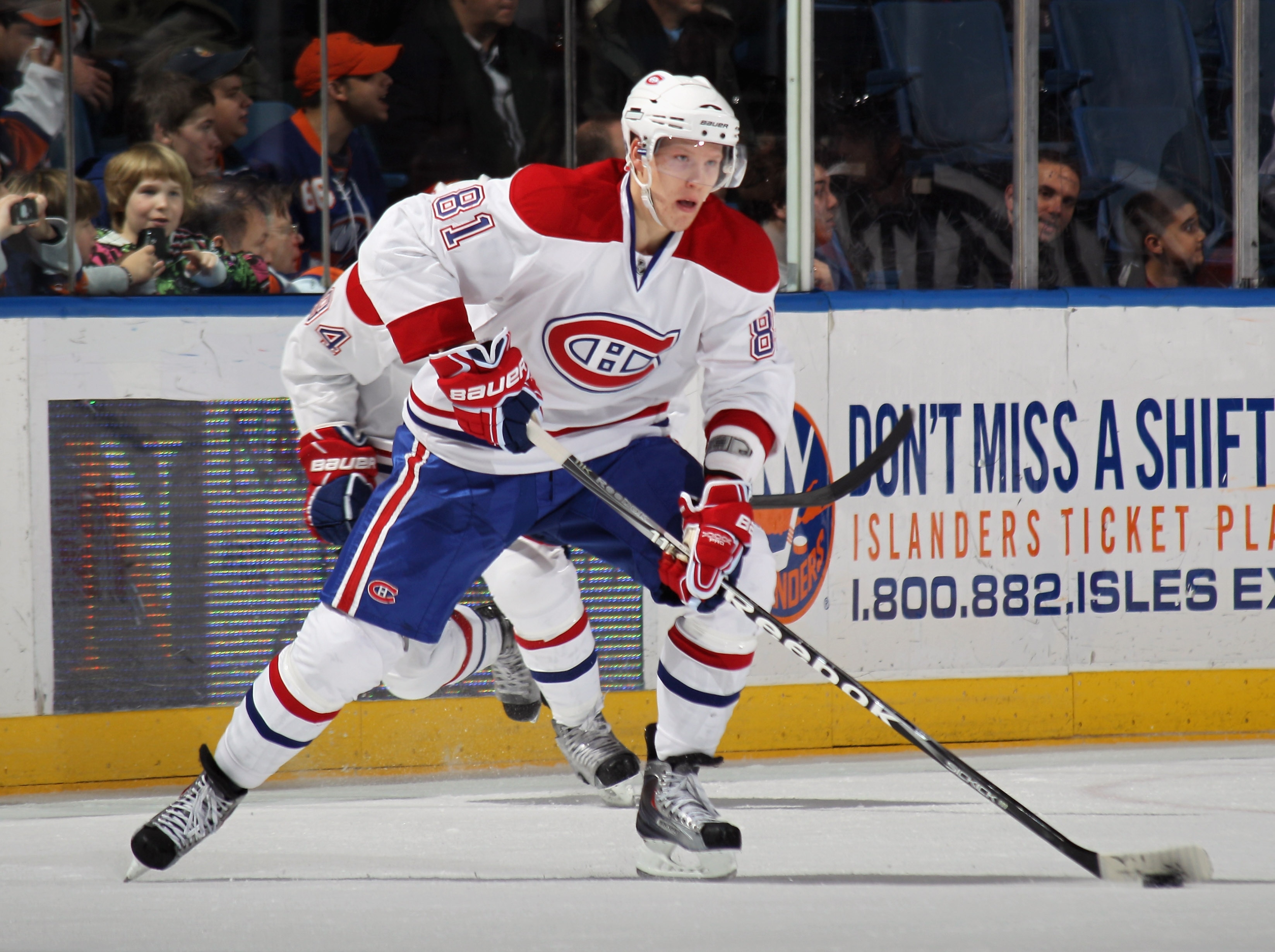 UNIONDALE, NY - DECEMBER 26: Lars Eller #81 of the Montreal Canadiens skates against the New York Islanders at the Nassau Coliseum on December 26, 2010 in Uniondale, New York. The Islanders defeated the Canadiens 4-1.  (Photo by Bruce Bennett/Getty Images