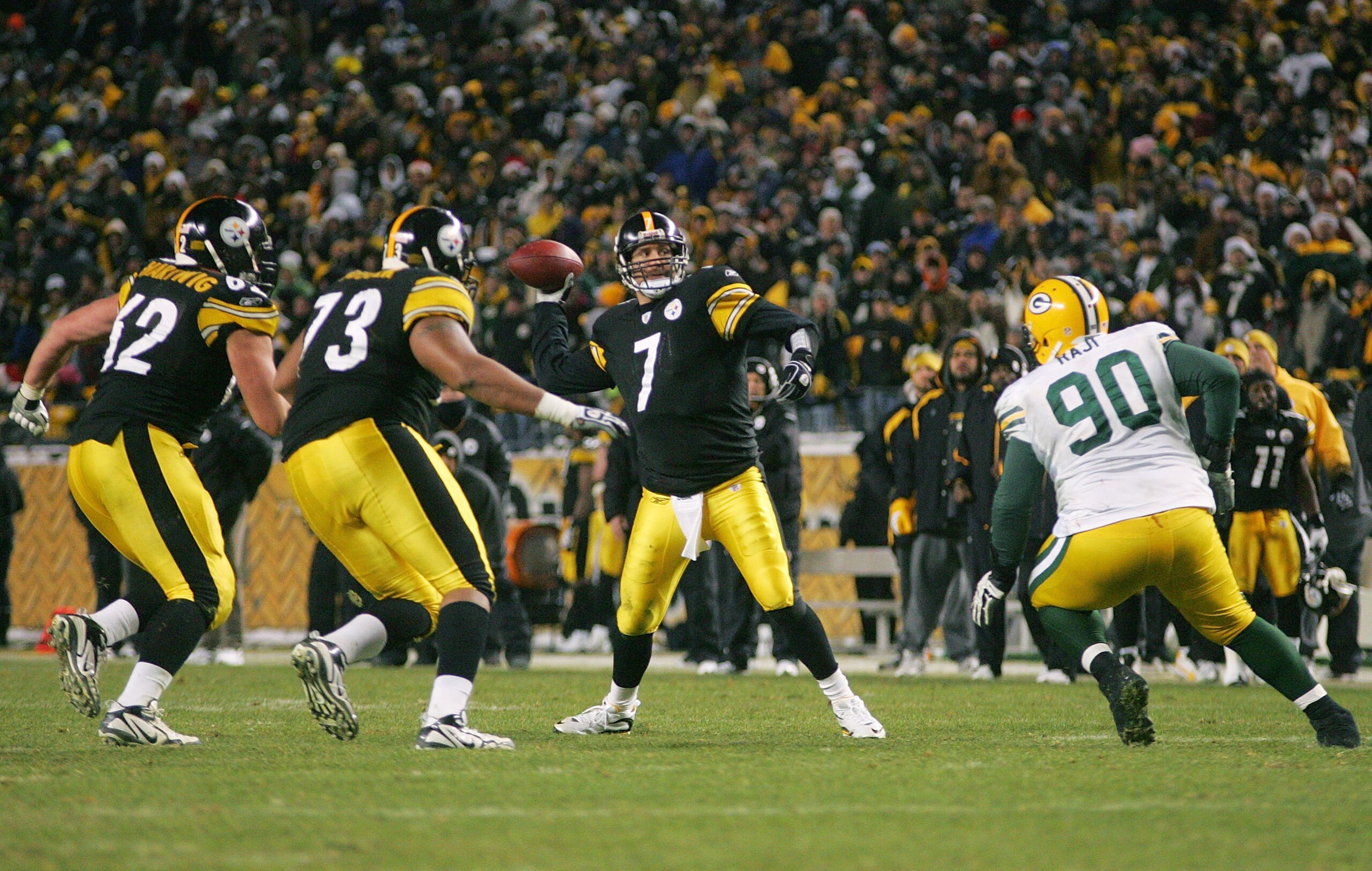 PITTSBURGH - DECEMBER 20: Ben Roethlisberger #7 of the Pittsburgh Steelers throws the game winning touchdown pass in the fourth quarter in front of BJ Raji #90 of the Green Bay Packers during the game on December 20, 2009 at Heinz Field in Pittsburgh, Pen PITTSBURGH - DECEMBER 20: Ben Roethlisberger #7 of the Pittsburgh Steelers throws the game winning touchdown pass in the fourth quarter in front of BJ Raji #90 of the Green Bay Packers during the game on December 20, 2009 at Heinz Field in Pittsburgh, Pen