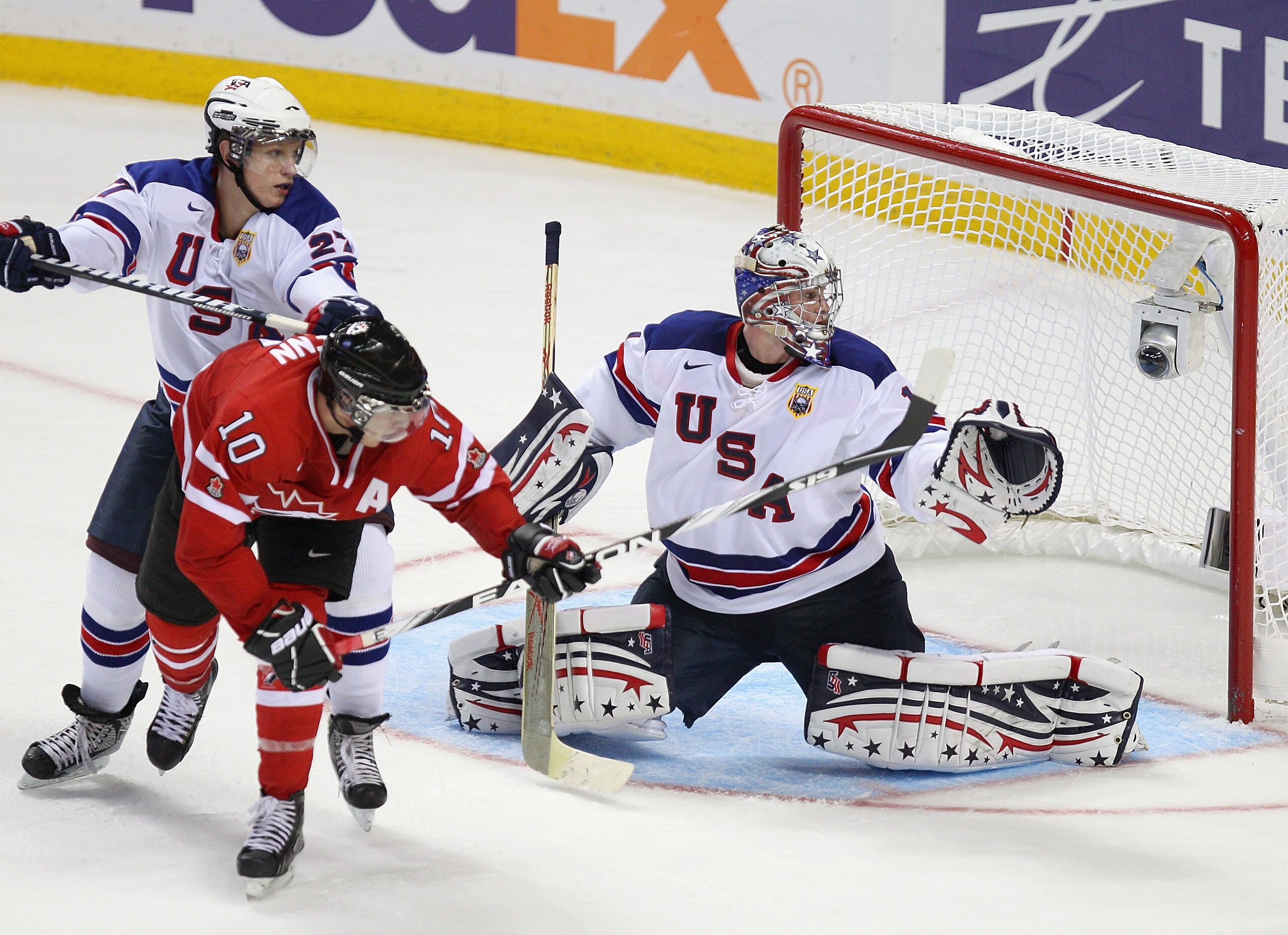 BUFFALO, NY - JANUARY 03: Jack Campbell #1 and Nick Bjugstad #27 of the United States defend against Brayden Schenn #10 of Canada during the 2011 IIHF World U20 Championship Semi Final game between United States and Canada on January 3, 2011 in Buffalo, N BUFFALO, NY - JANUARY 03: Jack Campbell #1 and Nick Bjugstad #27 of the United States defend against Brayden Schenn #10 of Canada during the 2011 IIHF World U20 Championship Semi Final game between United States and Canada on January 3, 2011 in Buffalo, N