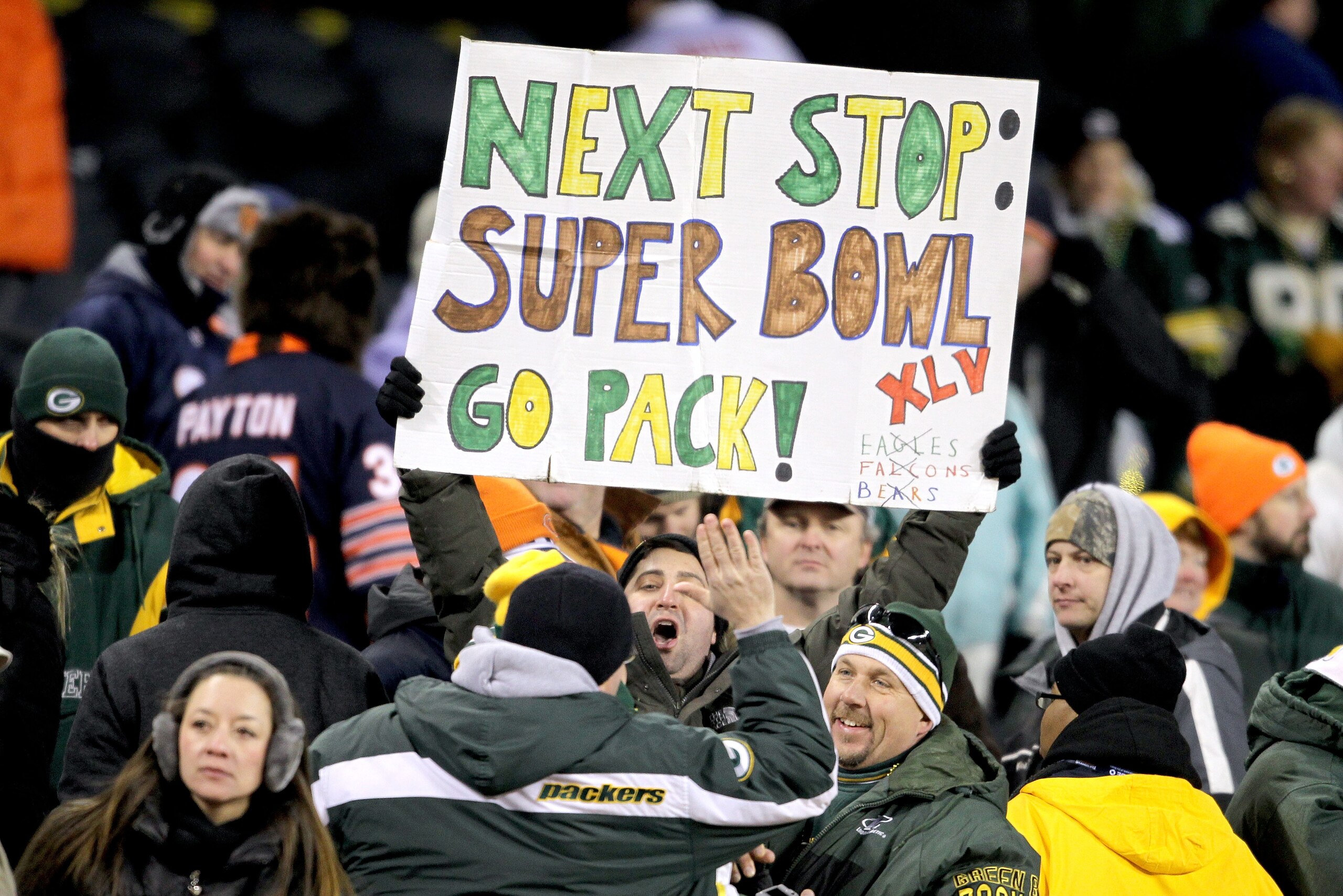 CHICAGO, IL - JANUARY 23: Green Bay Packers fans hold up a Super Bowl sign after the Packers 21-14 victory against the Chicago Bears in the NFC Championship Game at Soldier Field on January 23, 2011 in Chicago, Illinois. (Photo by Andy Lyons/Getty Image CHICAGO, IL - JANUARY 23: Green Bay Packers fans hold up a Super Bowl sign after the Packers 21-14 victory against the Chicago Bears in the NFC Championship Game at Soldier Field on January 23, 2011 in Chicago, Illinois. (Photo by Andy Lyons/Getty Image