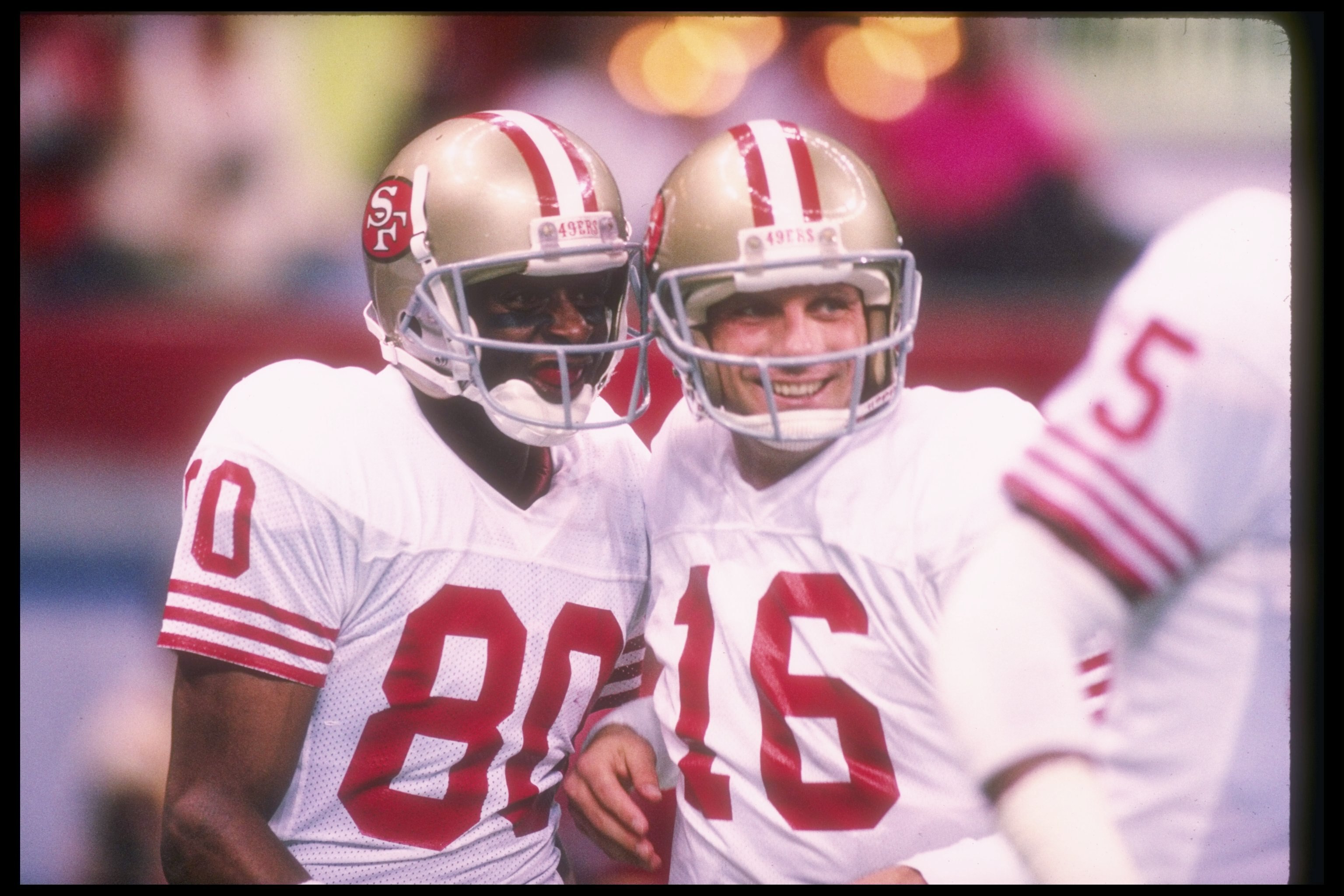 28 Jan 1990:  San Francisco 49ers quarterback Joe Montana (right) and wide receiver Jerry Rice celebrate during Super Bowl XXIV against the Denver Broncos at the Superdome in New Orleans, Louisiana.  The 49ers won the game, 55-10. Mandatory Credit: Rick S