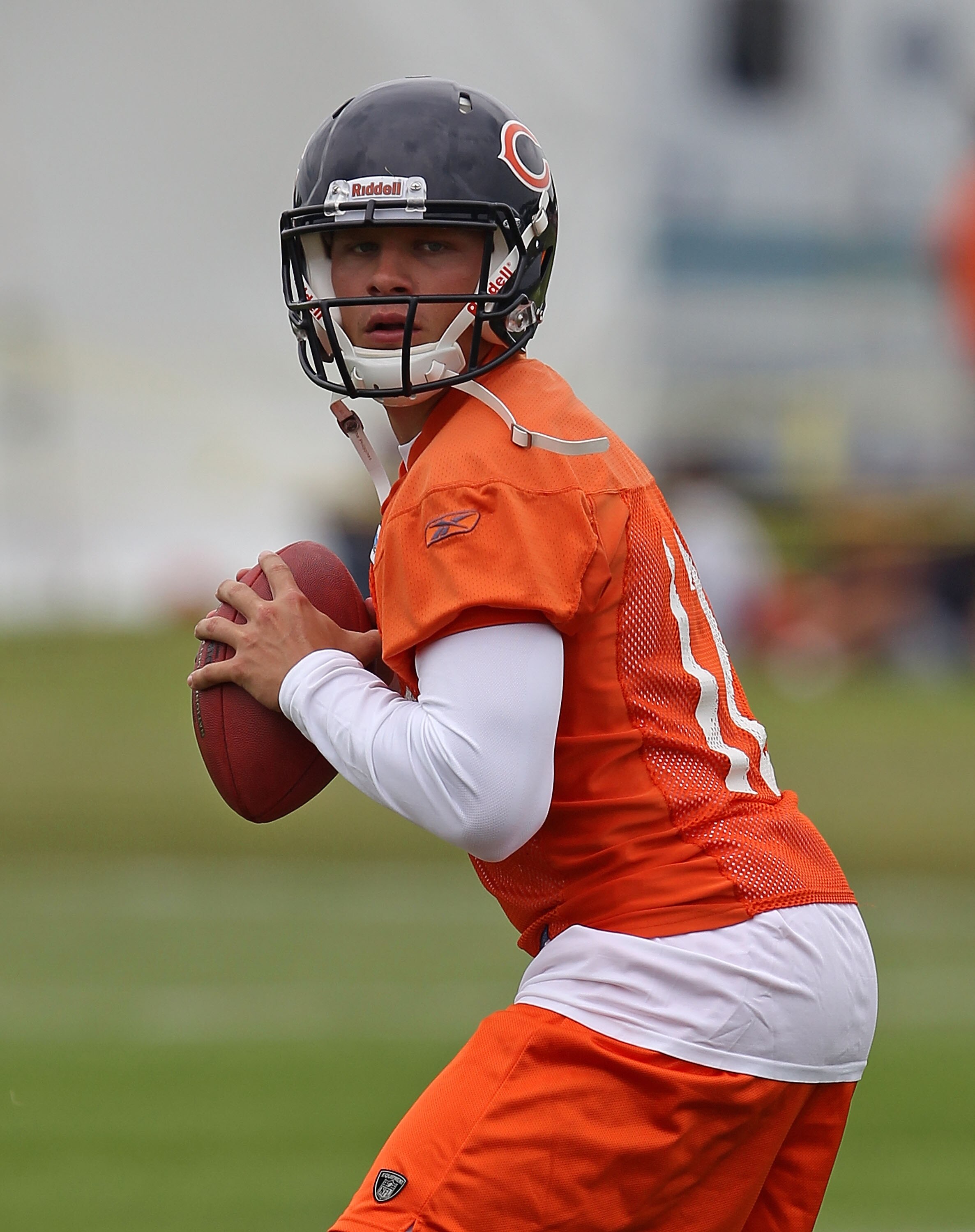 BOURBONNAIS, IL - JULY 30: Caleb Hanie #12 of the Chicago Bears works out during a summer training camp practice at Olivet Nazarene University on July 30, 2010 in Bourbonnais, Illinois. (Photo by Jonathan Daniel/Getty Images)