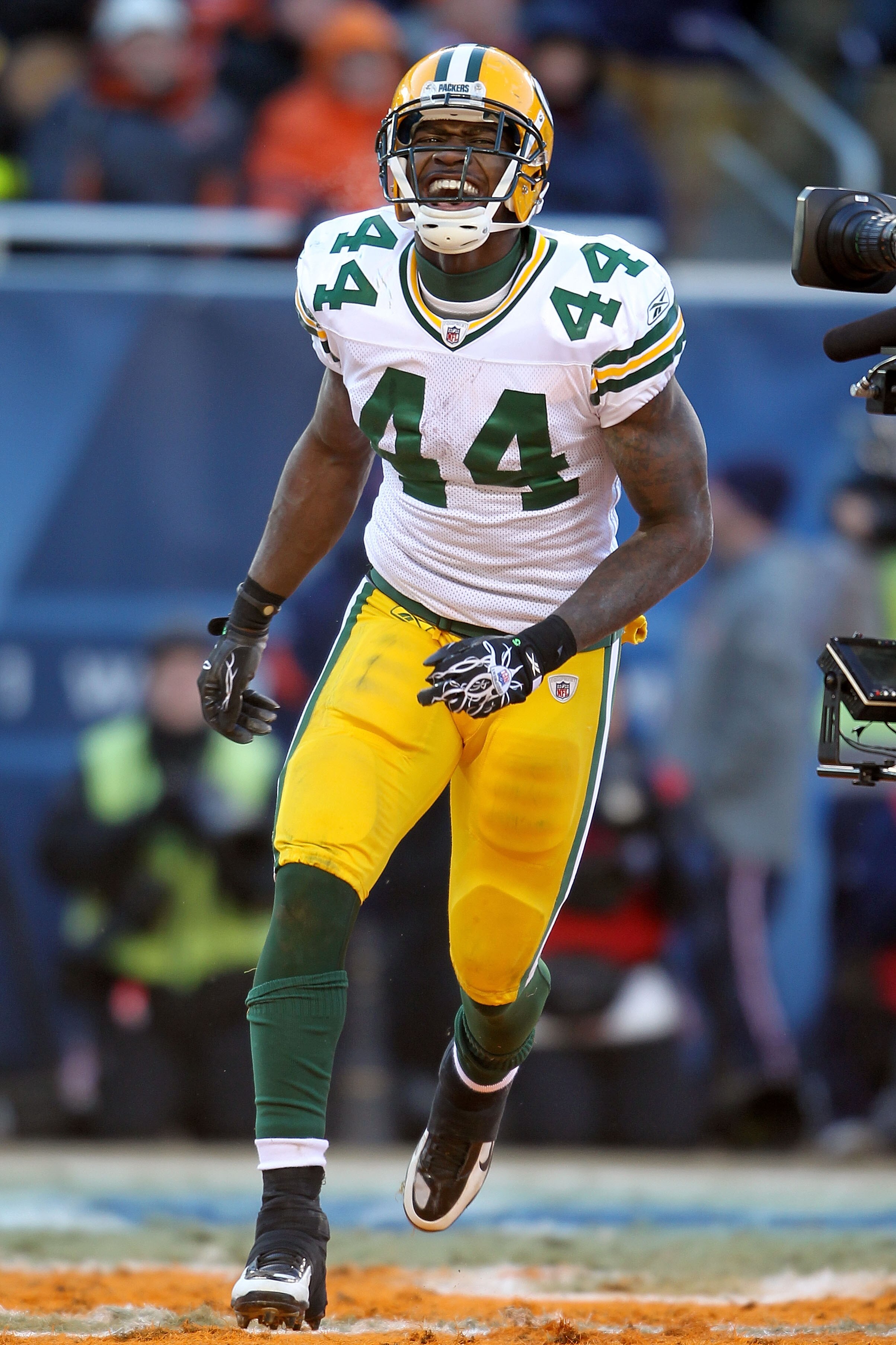 CHICAGO, IL - JANUARY 23: Running back James Starks #44 of the Green Bay Packers reacts after his four-yard second quarter touchdown run against the Chicago Bears in the NFC Championship Game at Soldier Field on January 23, 2011 in Chicago, Illinois. (P CHICAGO, IL - JANUARY 23: Running back James Starks #44 of the Green Bay Packers reacts after his four-yard second quarter touchdown run against the Chicago Bears in the NFC Championship Game at Soldier Field on January 23, 2011 in Chicago, Illinois. (P