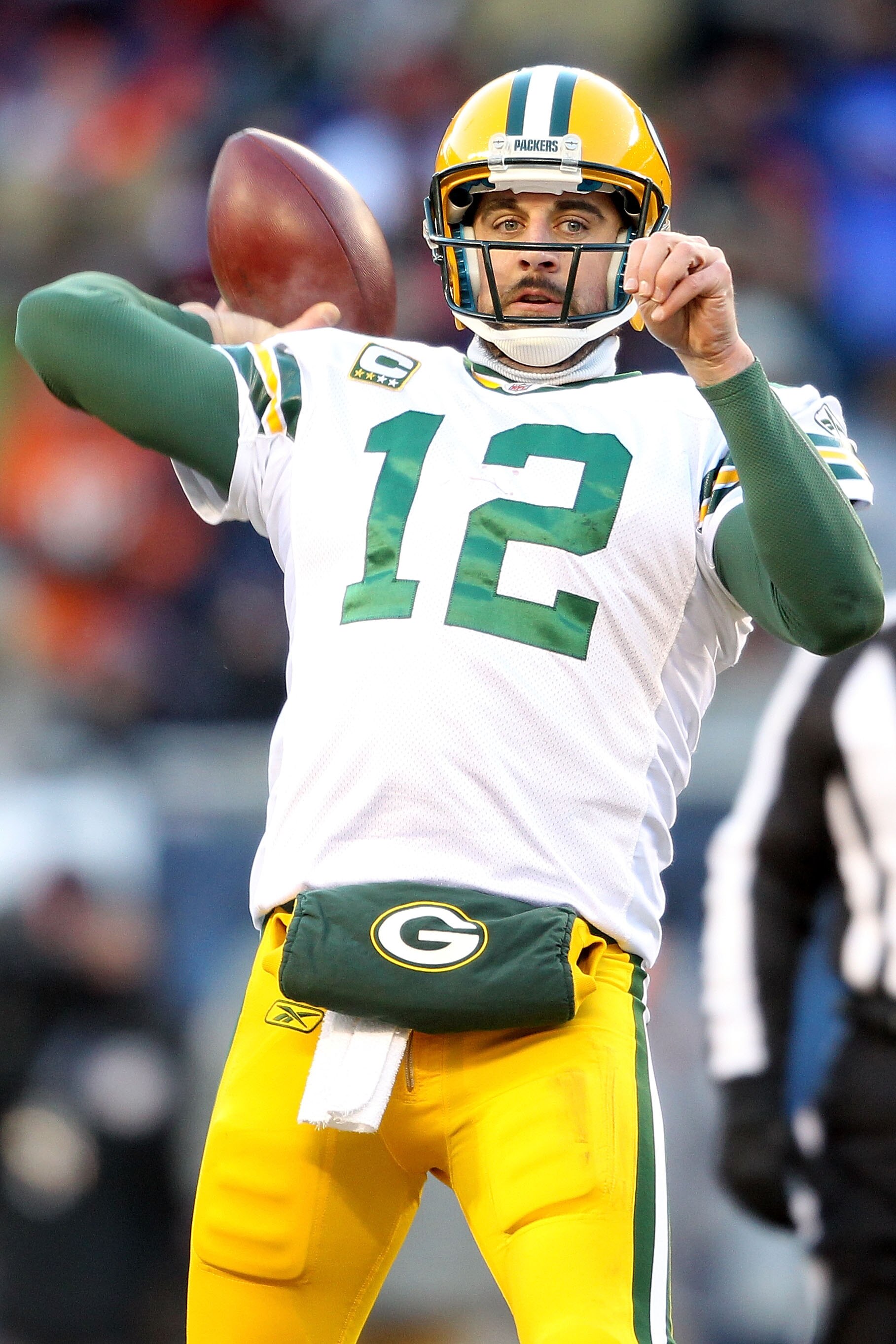 CHICAGO, IL - JANUARY 23: Quarterback Aaron Rodgers #12 of the Green Bay Packers throws a pass in the third quarter against Chicago Bears in the NFC Championship Game at Soldier Field on January 23, 2011 in Chicago, Illinois. (Photo by Andy Lyons/Getty CHICAGO, IL - JANUARY 23: Quarterback Aaron Rodgers #12 of the Green Bay Packers throws a pass in the third quarter against Chicago Bears in the NFC Championship Game at Soldier Field on January 23, 2011 in Chicago, Illinois. (Photo by Andy Lyons/Getty