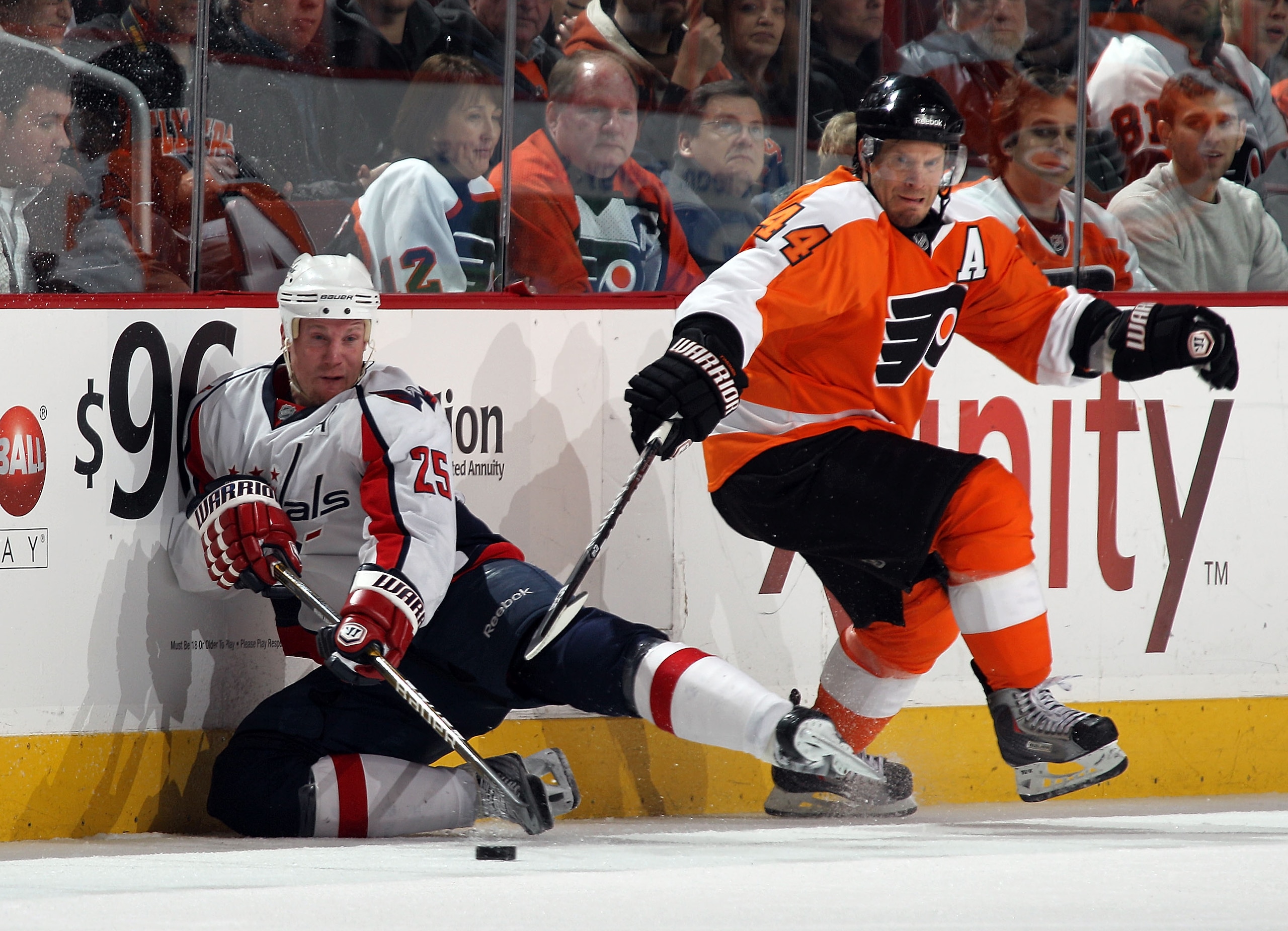 PHILADELPHIA, PA - JANUARY 18: Jason Chimera #25 of the Washington Capitals skates against Kimmo Timonen #44 of the Philadelphia Flyers at the Wells Fargo Center on January 18, 2011 in Philadelphia, Pennsylvania. (Photo by Bruce Bennett/Getty Images) PHILADELPHIA, PA - JANUARY 18: Jason Chimera #25 of the Washington Capitals skates against Kimmo Timonen #44 of the Philadelphia Flyers at the Wells Fargo Center on January 18, 2011 in Philadelphia, Pennsylvania. (Photo by Bruce Bennett/Getty Images)
