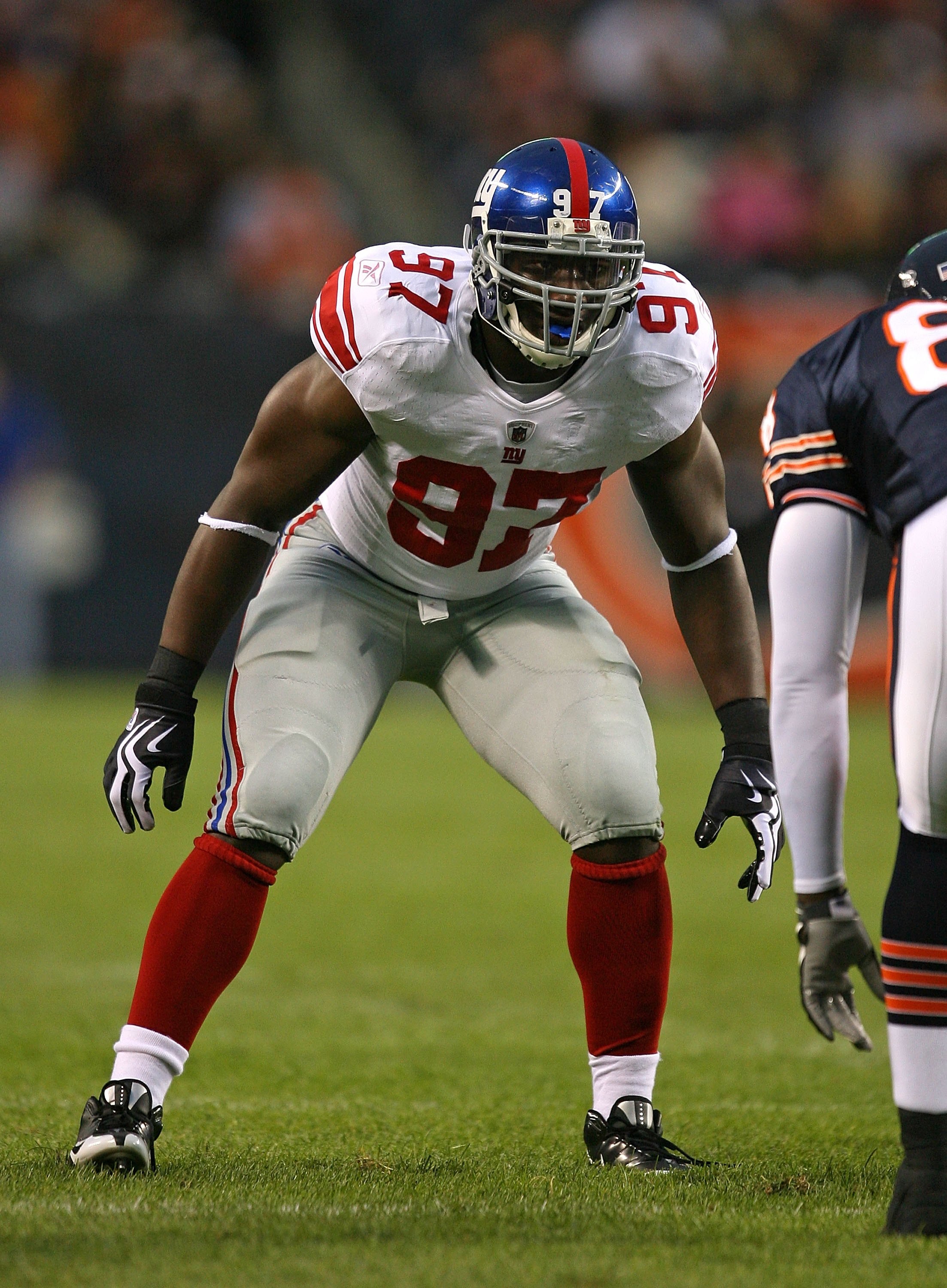 CHICAGO - AUGUST 22: Mathias Kiwanuka #97 of the New York Giants prepares to rush against the Chicago Bears during a pre-season game on August 22, 2009 at Soldier Field in Chicago, Illinois. The Bears defeated the Giants 17-3. (Photo by Jonathan Daniel/Ge