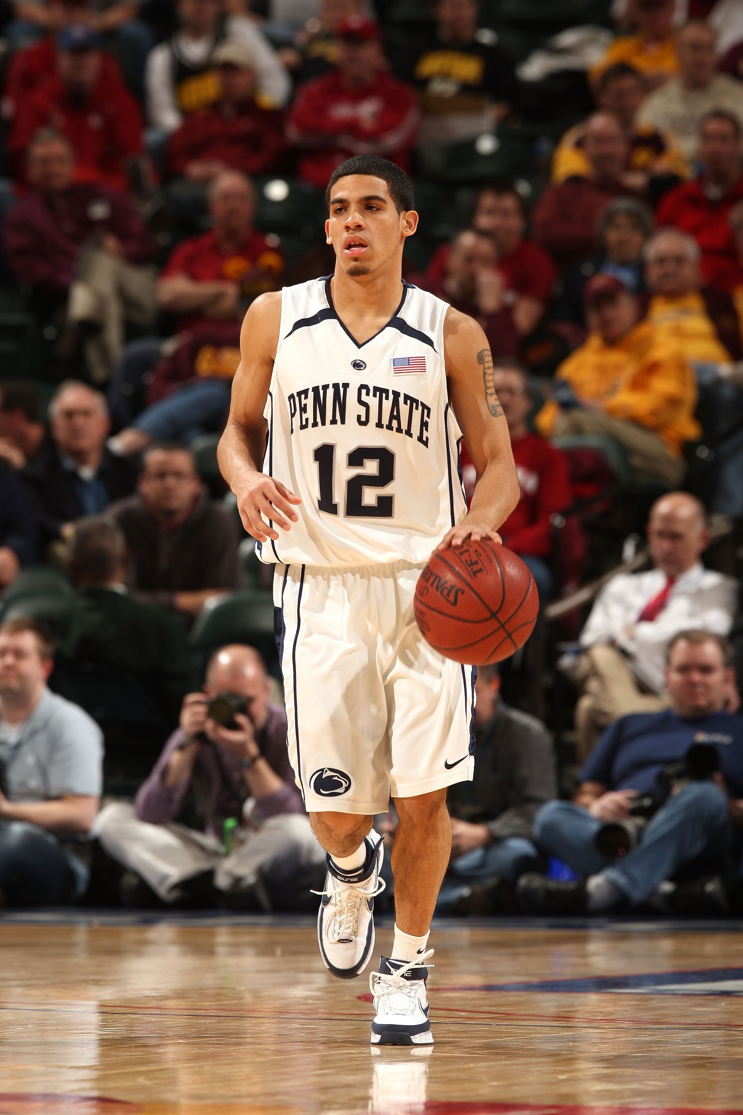 INDIANAPOLIS - MARCH 12:  Talor Battle #12 of the Penn State Nittany Lions brings the ball up court against the Indiana Hoosiers during the first round of the Big Ten Men's Basketball Tournament at Conseco Fieldhouse on March 12, 2009 in Indianapolis, Ind