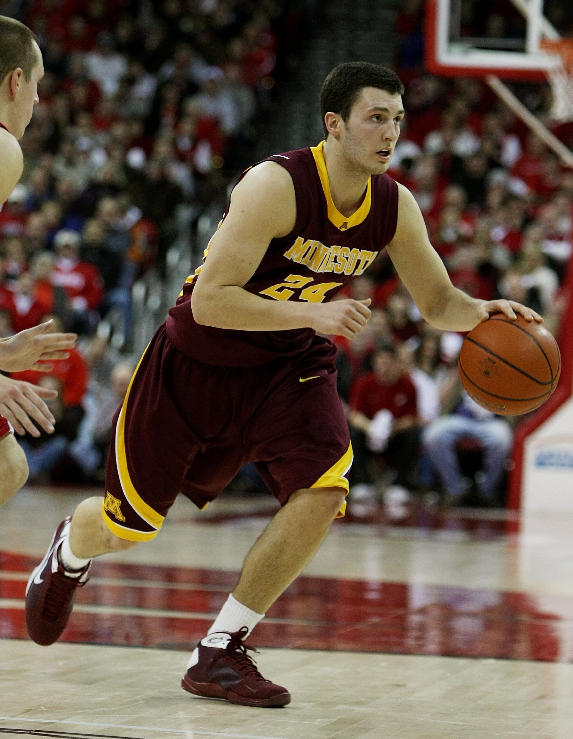 MADISON, WI - JANUARY 15: Blake Hoffarber #24 of the Minnesota Golden Gophers moves against the Wisconsin Badgers on January 15, 2009 at the Kohl Center in Madison, Wisconsin. Minnesota defeated Wisconsin 78-74 in overtime. (Photo by Jonathan Daniel/Getty
