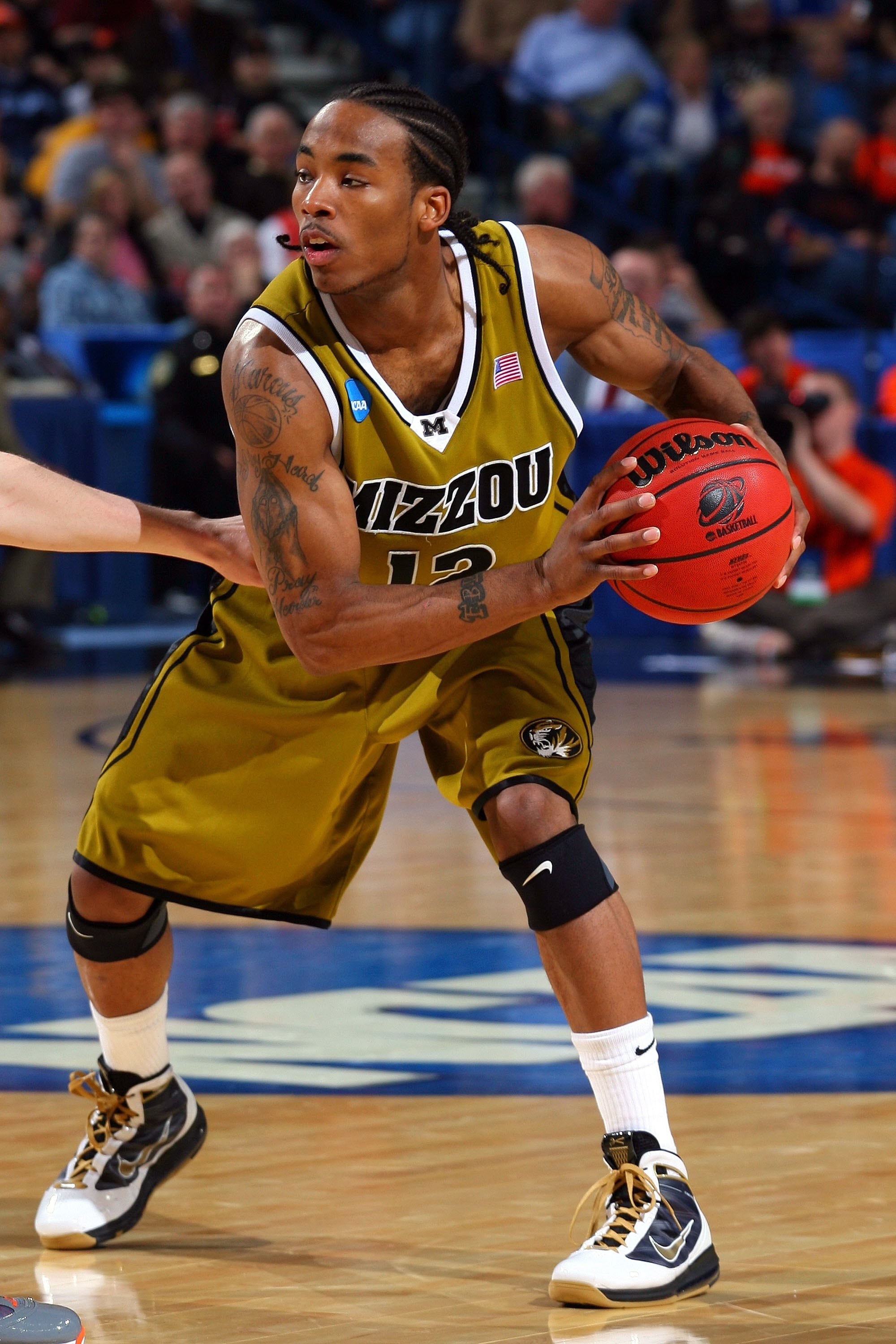 BUFFALO, NY - MARCH 19:   Marcus Denmon #12 of the Missouri Tigers looks on against the Clemson Tigers during the first round of the 2010 NCAA men's basketball tournament at HSBC Arena on March 19, 2010 in Buffalo, New York.  (Photo by Rick Stewart/Getty