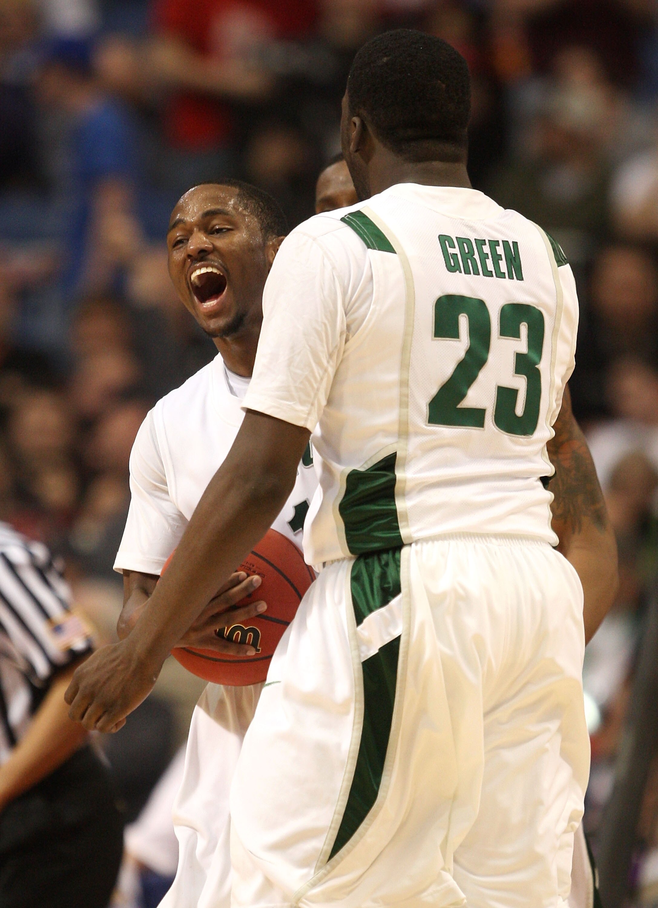 MINNEAPOLIS - MARCH 22:  (L-R) Kalin Lucas #1 and Draymond Green #23 of the Michigan State Spartans celebrate after their 74-69 win against the USC Trojans during the second round of the NCAA Division I Men's Basketball Tournament at the Hubert H. Humphre