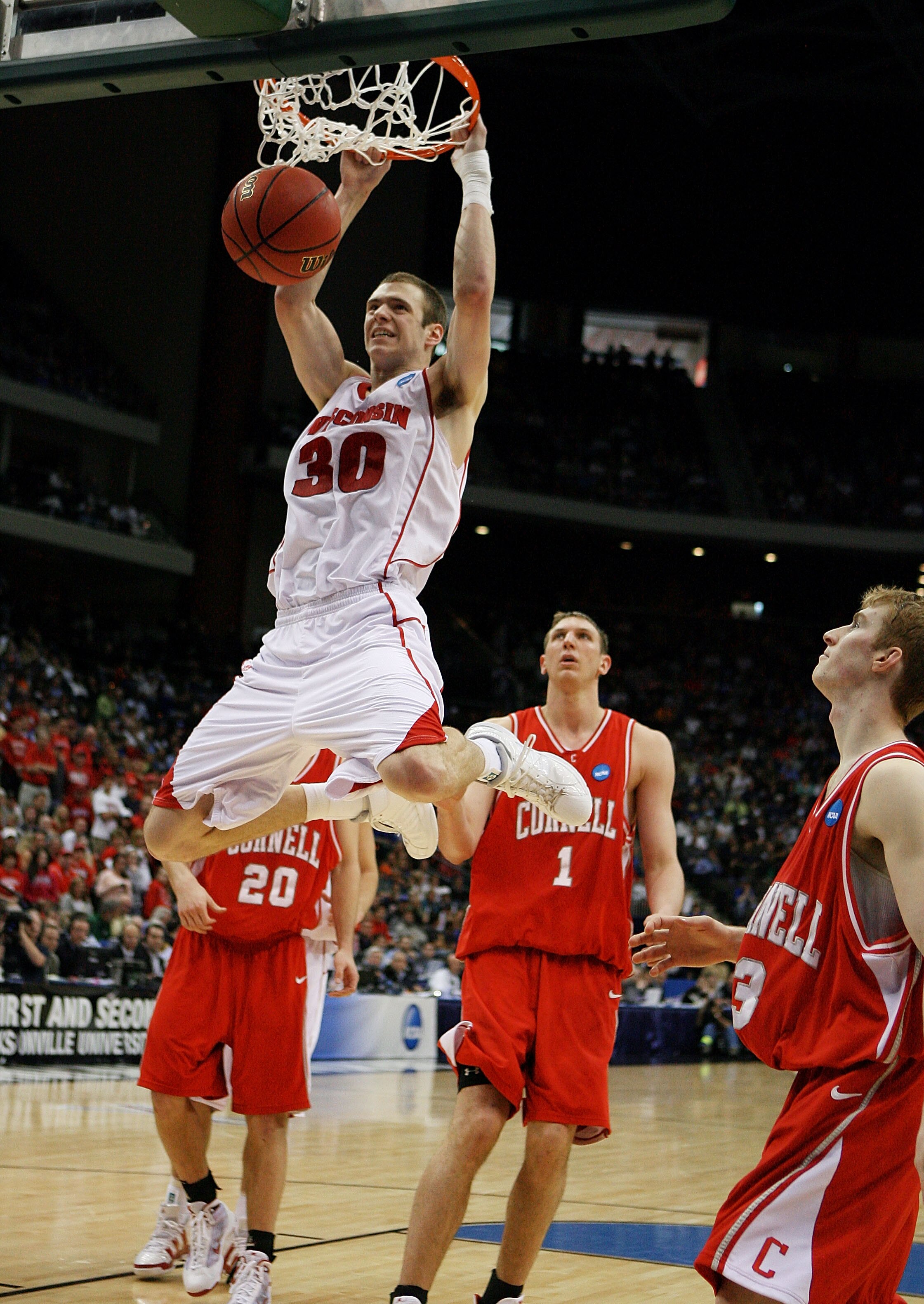 JACKSONVILLE, FL - MARCH 21: Jon Leuer #30 of the Wisconsin Badgers dunks against the Cornell Big Red during the second round of the 2010 NCAA men's basketball tournament at Jacksonville Veteran's Memorial Arena on March 21, 2010 in Jacksonville, Florida.