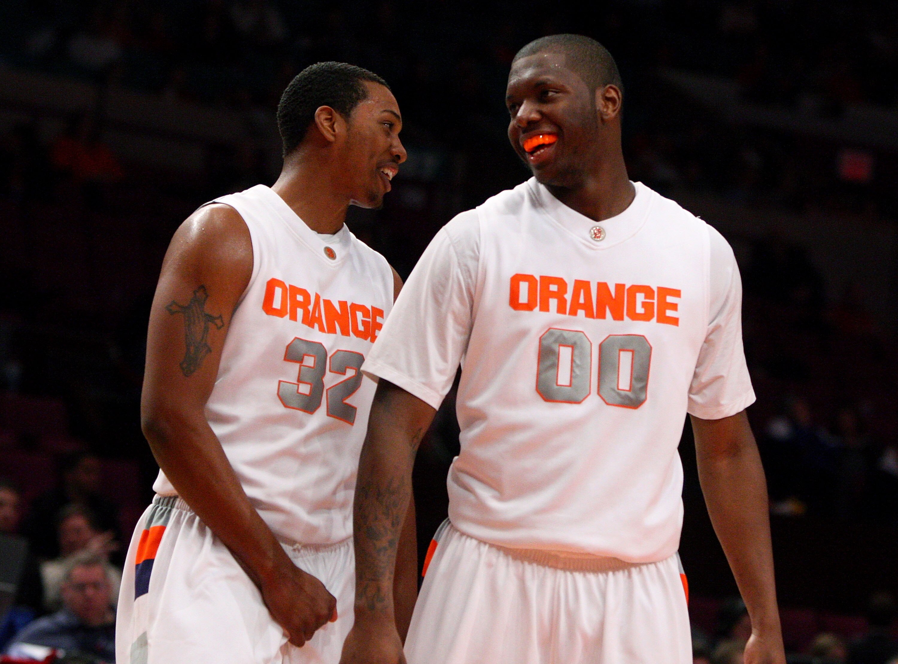 NEW YORK - MARCH 11: Kris Joseph #32 and Rick Jackson #00 of the Syracuse Orange react between plays against the Seton Hall Pirates during the second round of the Big East Tournament at Madison Square Garden on March 11, 2009 in New York City.  (Photo by