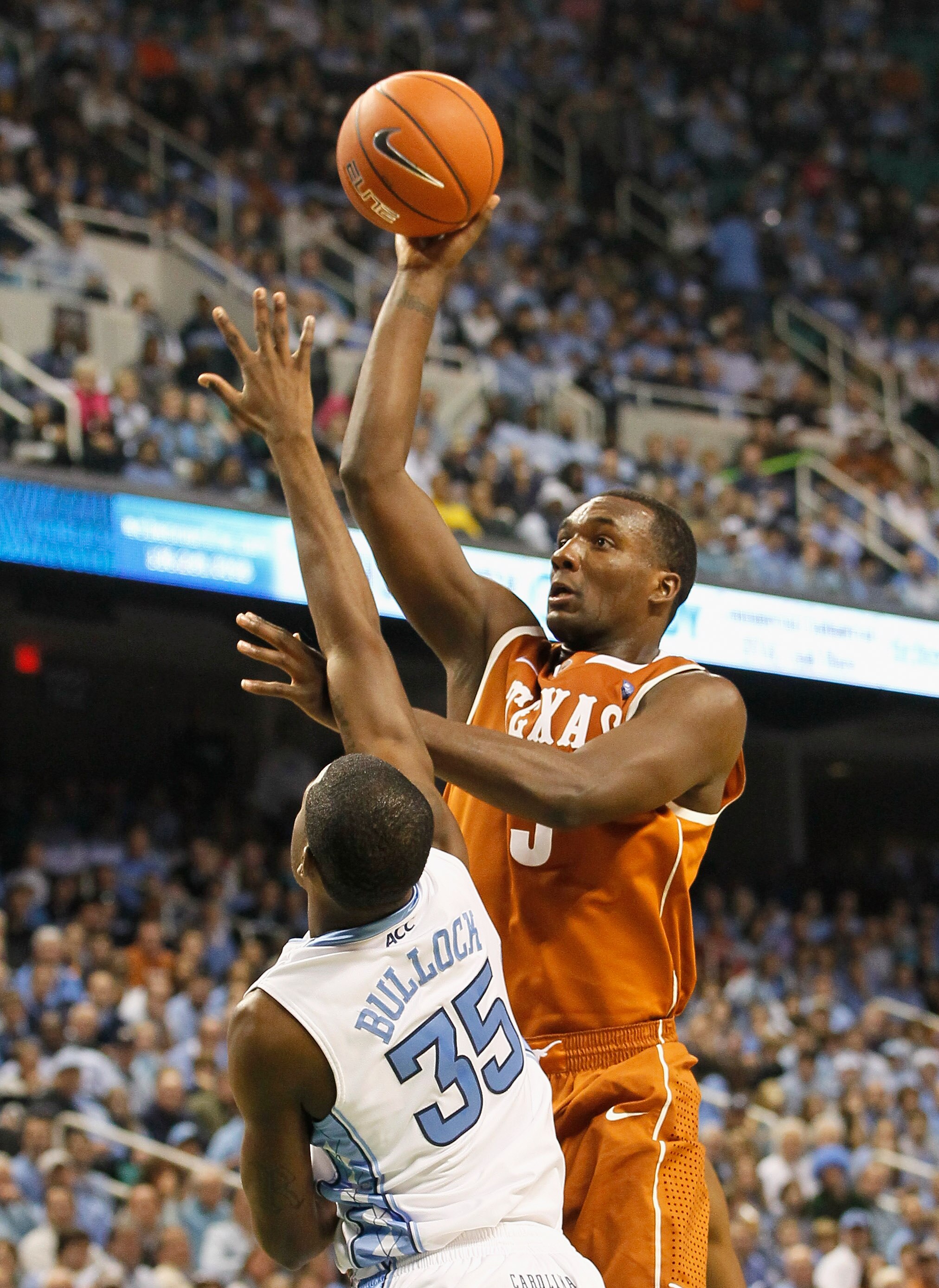 GREENSBORO, NC - DECEMBER 18:  Jordan Hamilton #3 of the Texas Longhorns shoots over Reggie Bullock #35 of the North Carolina Tar Heels at Greensboro Coliseum on December 18, 2010 in Greensboro, North Carolina.  (Photo by Kevin C. Cox/Getty Images)