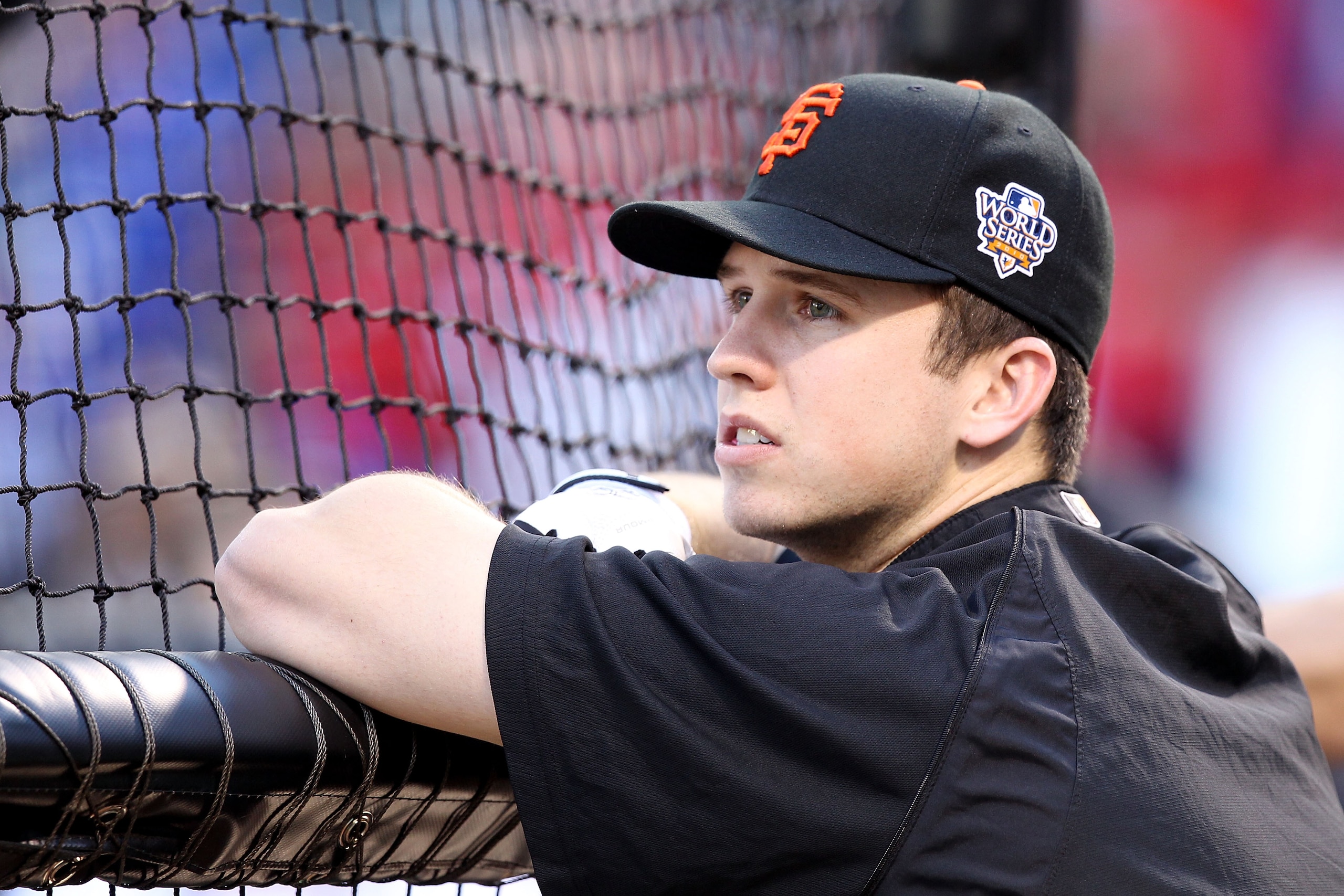 ARLINGTON, TX - OCTOBER 31: Buster Posey #28 of the San Francisco Giants looks on during batting practice against the Texas Rangers in Game Four of the 2010 MLB World Series at Rangers Ballpark in Arlington on October 31, 2010 in Arlington, Texas. (Phot ARLINGTON, TX - OCTOBER 31: Buster Posey #28 of the San Francisco Giants looks on during batting practice against the Texas Rangers in Game Four of the 2010 MLB World Series at Rangers Ballpark in Arlington on October 31, 2010 in Arlington, Texas. (Phot