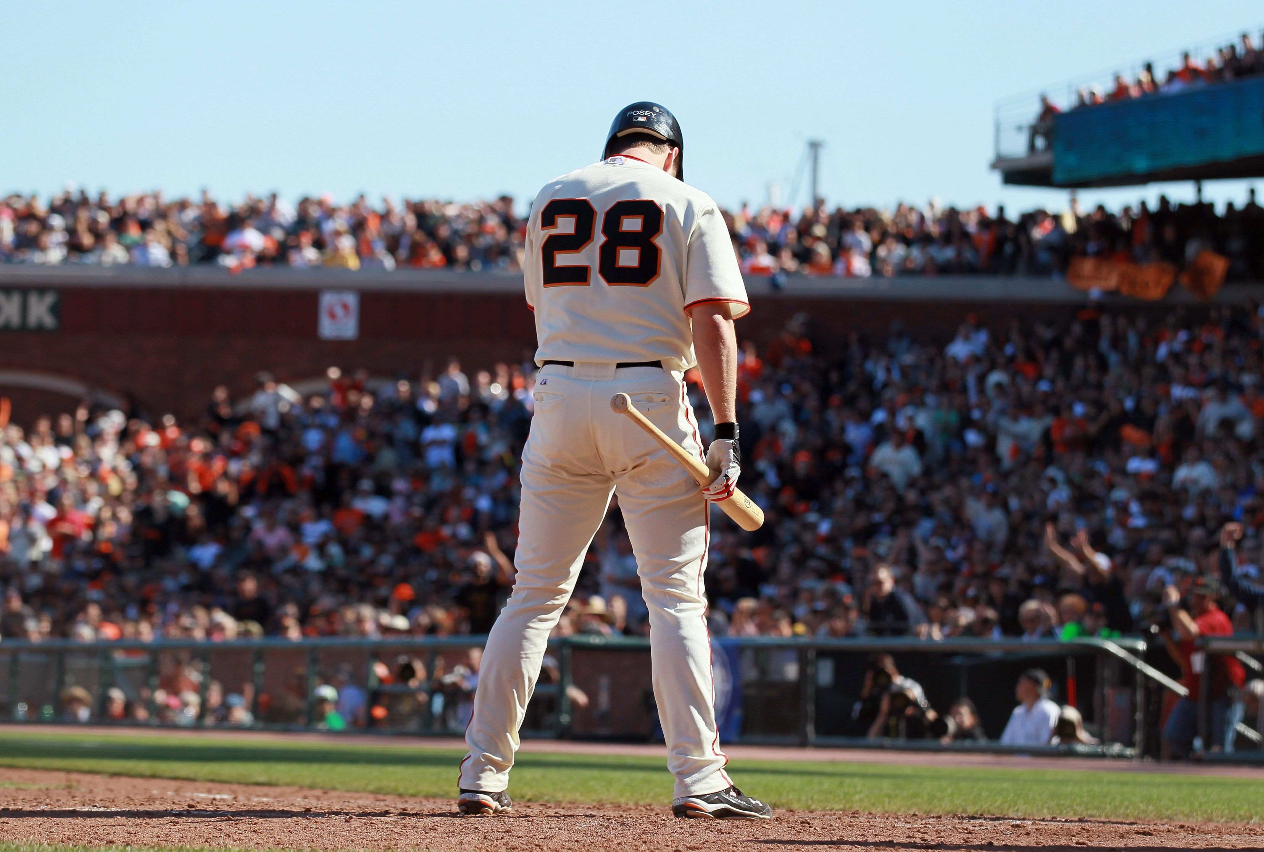 SAN FRANCISCO - OCTOBER 02:  Buster Posey #28 of the San Francisco Giants reacts after he was struck out during the sixth inning against the San Diego Padres at AT&T Park on October 2, 2010 in San Francisco, California.  (Photo by Justin Sullivan/Getty Im