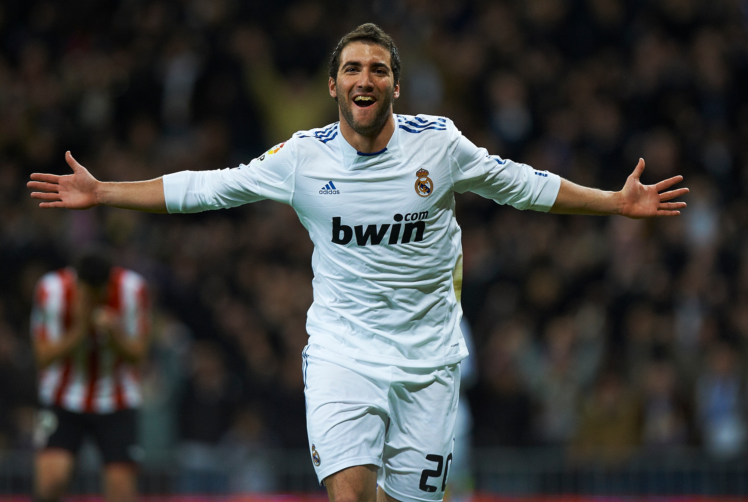MADRID, SPAIN - NOVEMBER 20:  Gonzalo Higuain of Real Madrid celebrates after scoring the 1-0 during the la liga match between Real Madrid and Athletic Bilbao at Estadio Santiago Bernabeu on November 20, 2010 in Madrid, Spain.  (Photo by Manuel Queimadelo