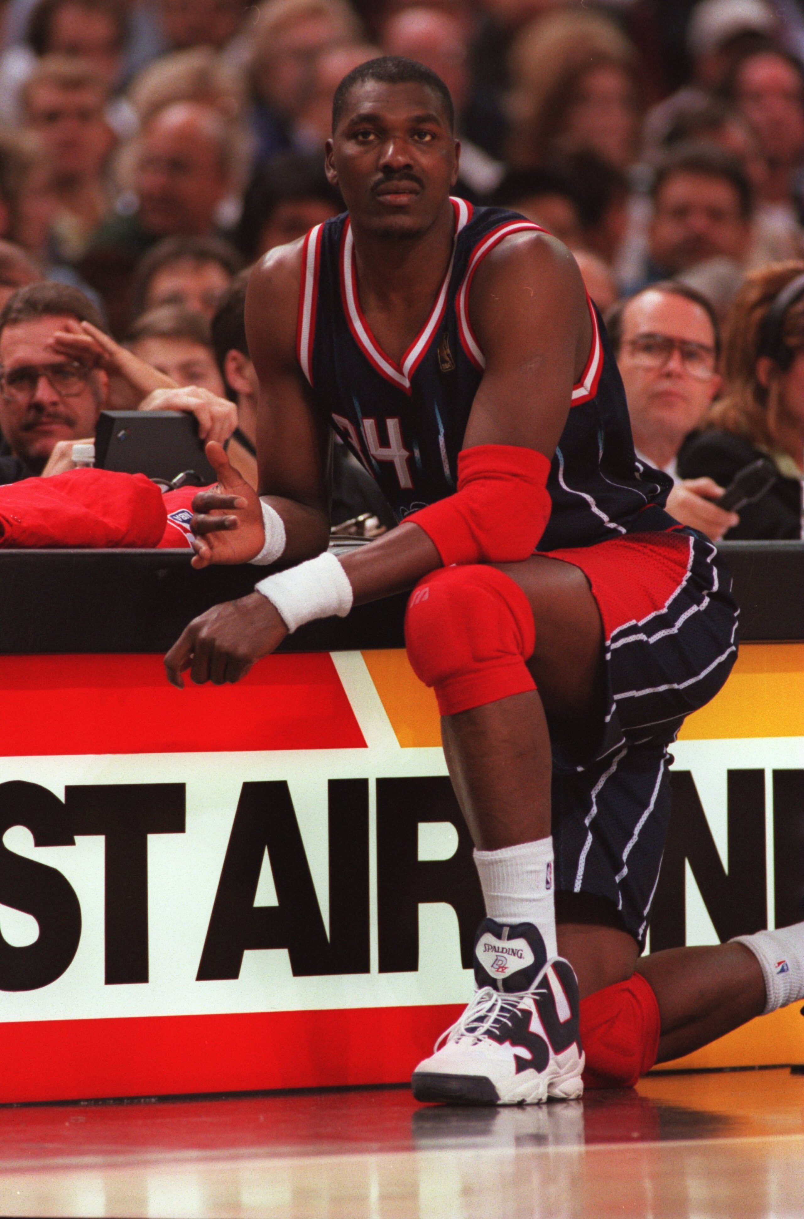 5 Nov 1996:  Center Hakeem Olajuwon of the Houston Rockets waits to enter the game during the Rockets 102-80 win over the Sacramento Kings at Arco Arena in Sacramento, California.  Mandatory Credit:  Otto Gruele/Allsport