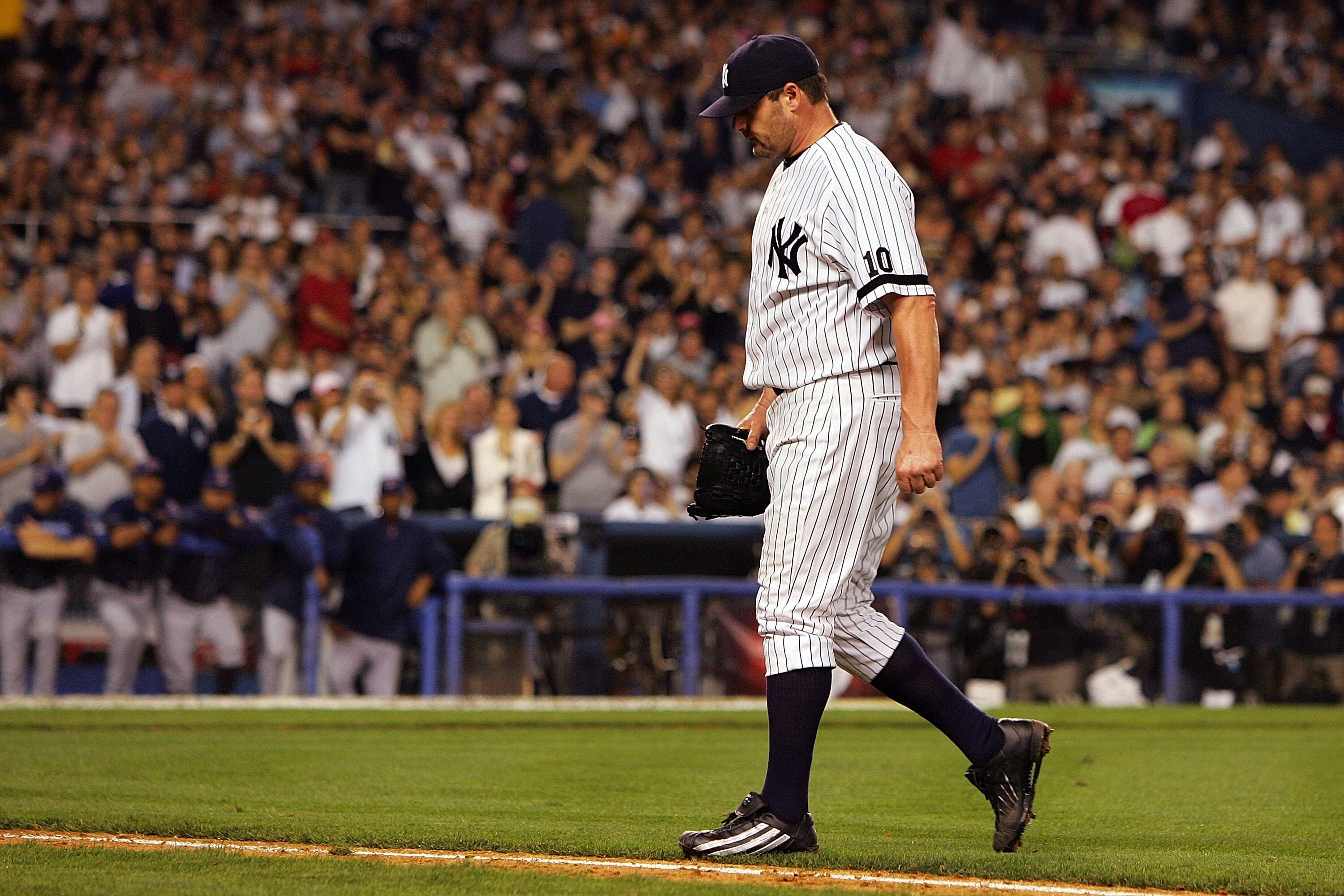 NEW YORK - OCTOBER 07:  Starting pitcher Roger Clemens #22 of the New York Yankees comes out of the game in the third inning against the Cleveland Indians during Game Three of the American League Division Series at Yankee Stadium on October 7, 2007 in the
