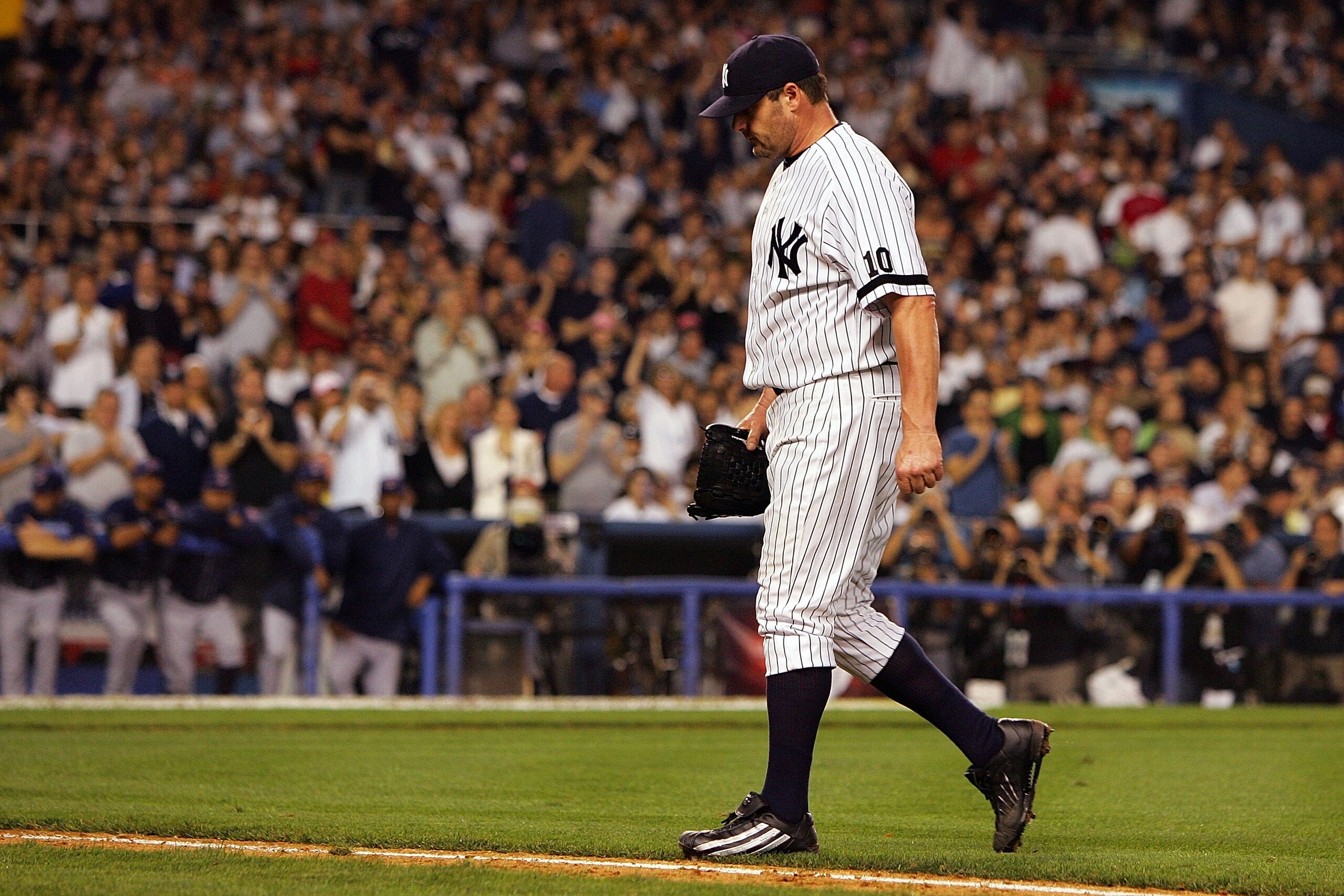 NEW YORK - OCTOBER 07:  Starting pitcher Roger Clemens #22 of the New York Yankees comes out of the game in the third inning against the Cleveland Indians during Game Three of the American League Division Series at Yankee Stadium on October 7, 2007 in the