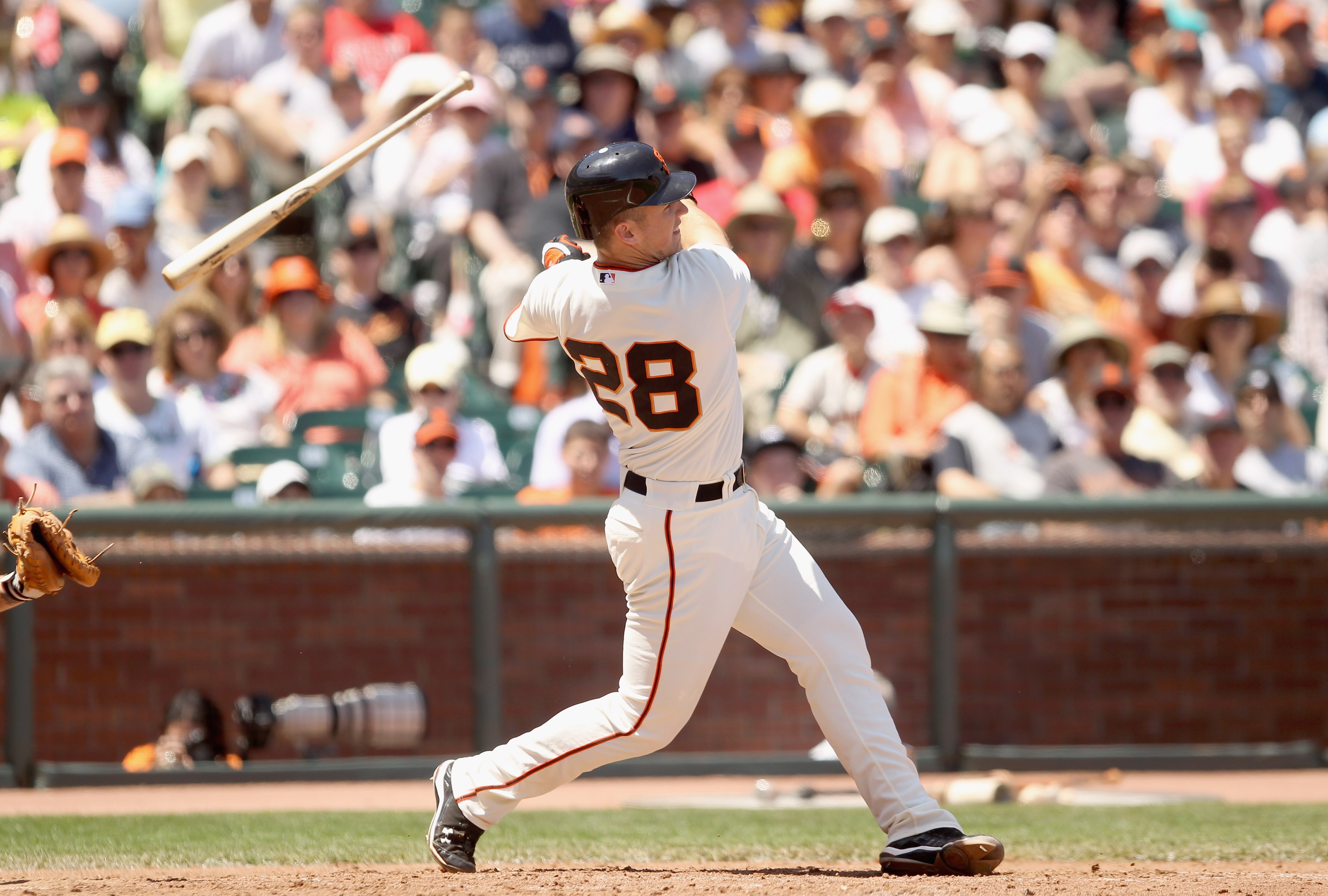 SAN FRANCISCO - MAY 30:  Buster Posey #28 of the San Francisco Giants looses his bat while batting during their game against the Arizona Diamondbacks at AT&T Park on May 30, 2010 in San Francisco, California.  (Photo by Ezra Shaw/Getty Images)