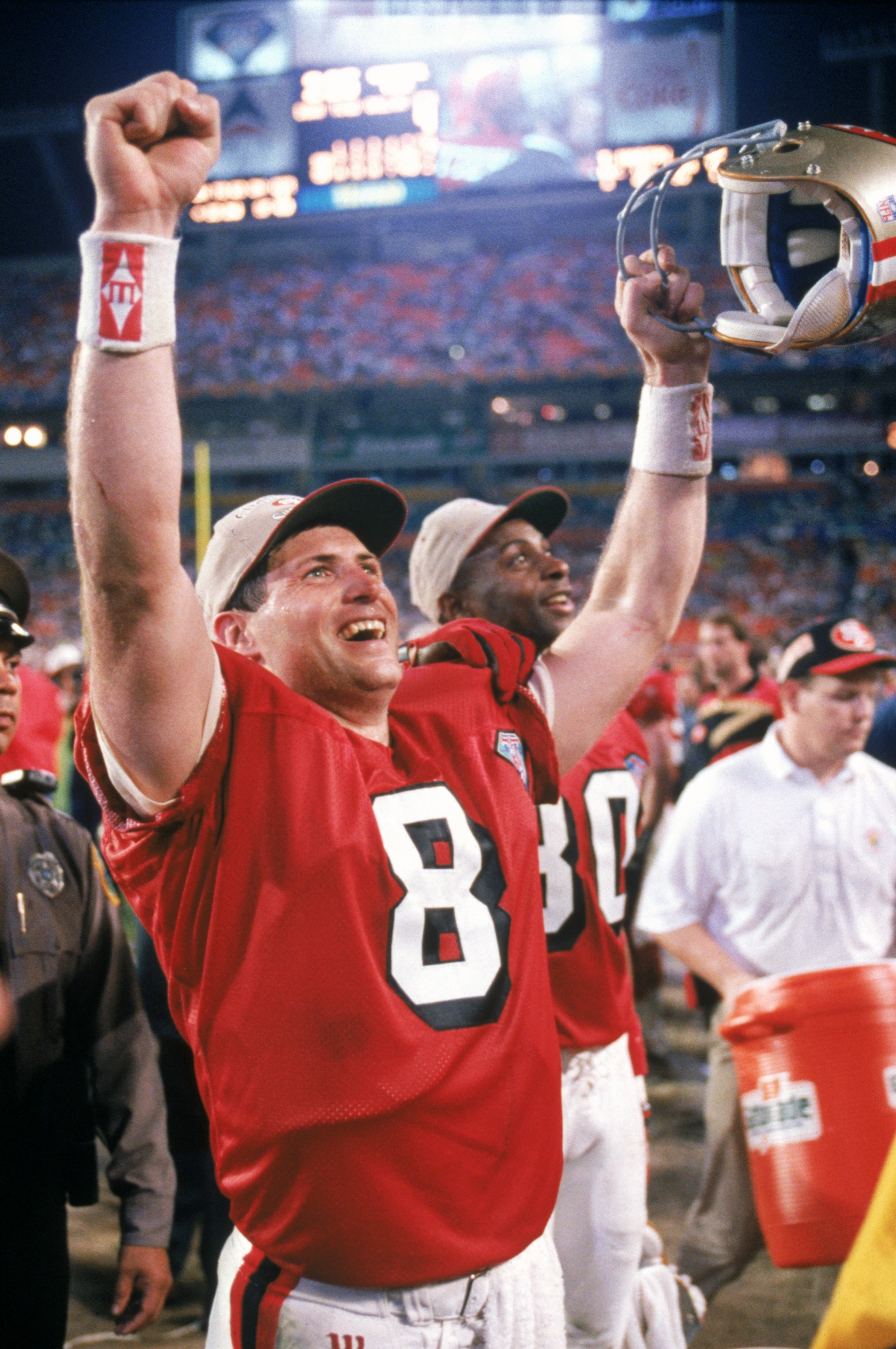 MIAMI - JANUARY 29:  Quarterback Steve Young #8 of the San Francisco 49ers celebrates following their Super Bowl XXIX against the San Diego Chargers at Joe Robbie Stadium on January 29, 1995 in Miami, Florida. The 49ers won 49-26. (Photo by George Rose/Ge