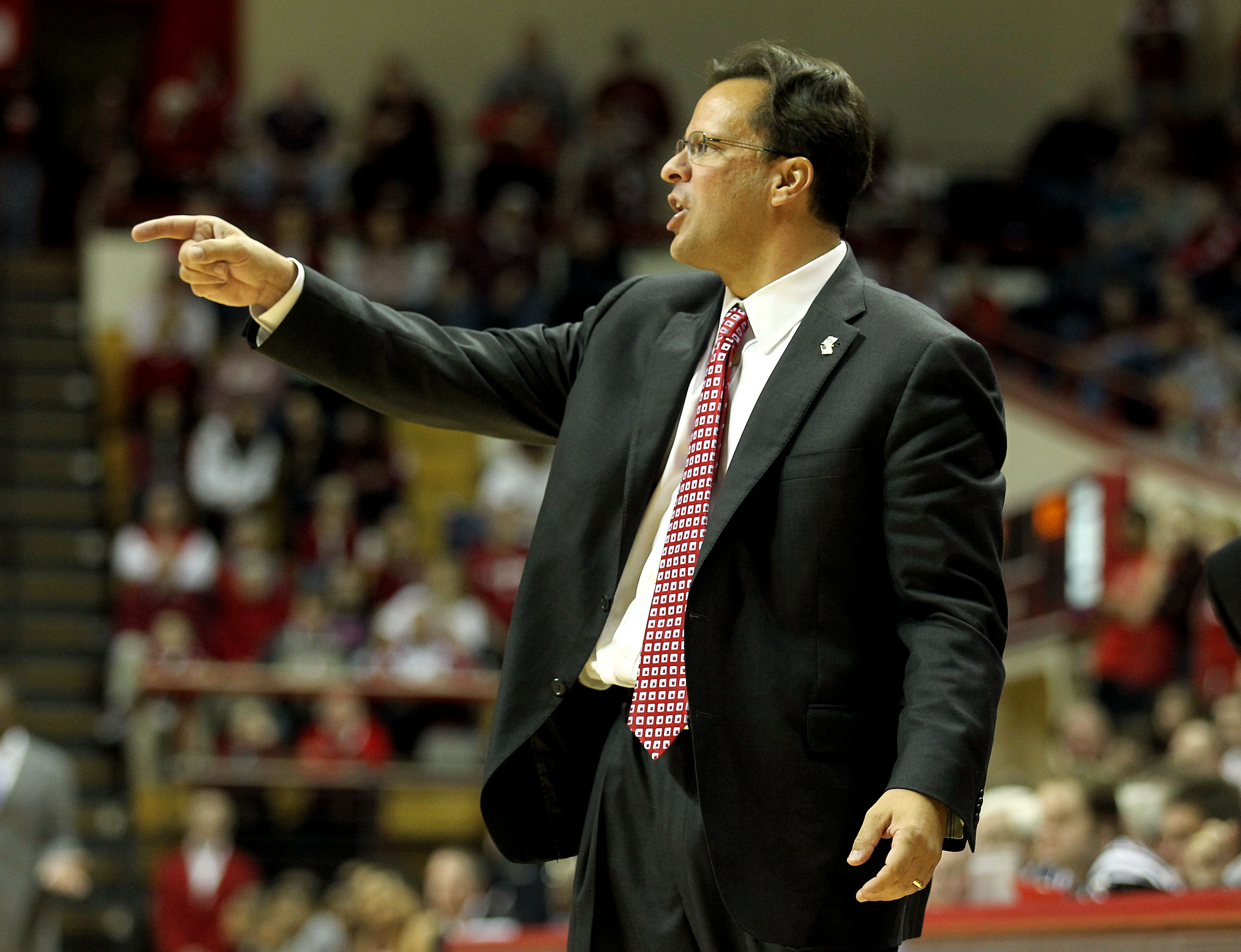 BLOOMINGTON, IN - NOVEMBER 23:  Tom Crean the Head Coach of the Indiana Hoosiers gives instructions to his team during the game against the North Carolina Central Eagles at Assembly Hall on November 23, 2010 in Bloomington, Indiana.  Indiana won 72-56.  (