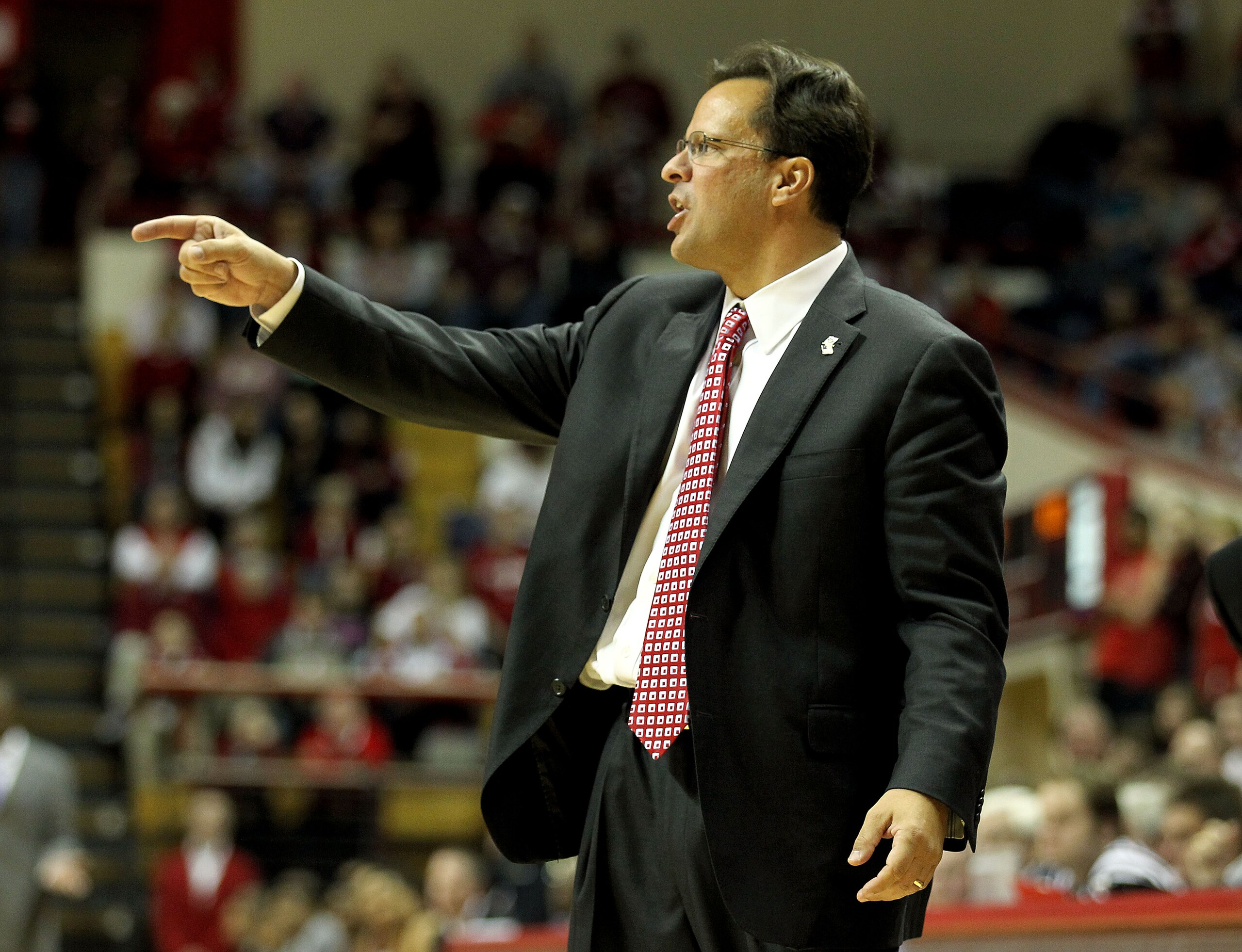 BLOOMINGTON, IN - NOVEMBER 23:  Tom Crean the Head Coach of the Indiana Hoosiers gives instructions to his team during the game against the North Carolina Central Eagles at Assembly Hall on November 23, 2010 in Bloomington, Indiana.  Indiana won 72-56.  (