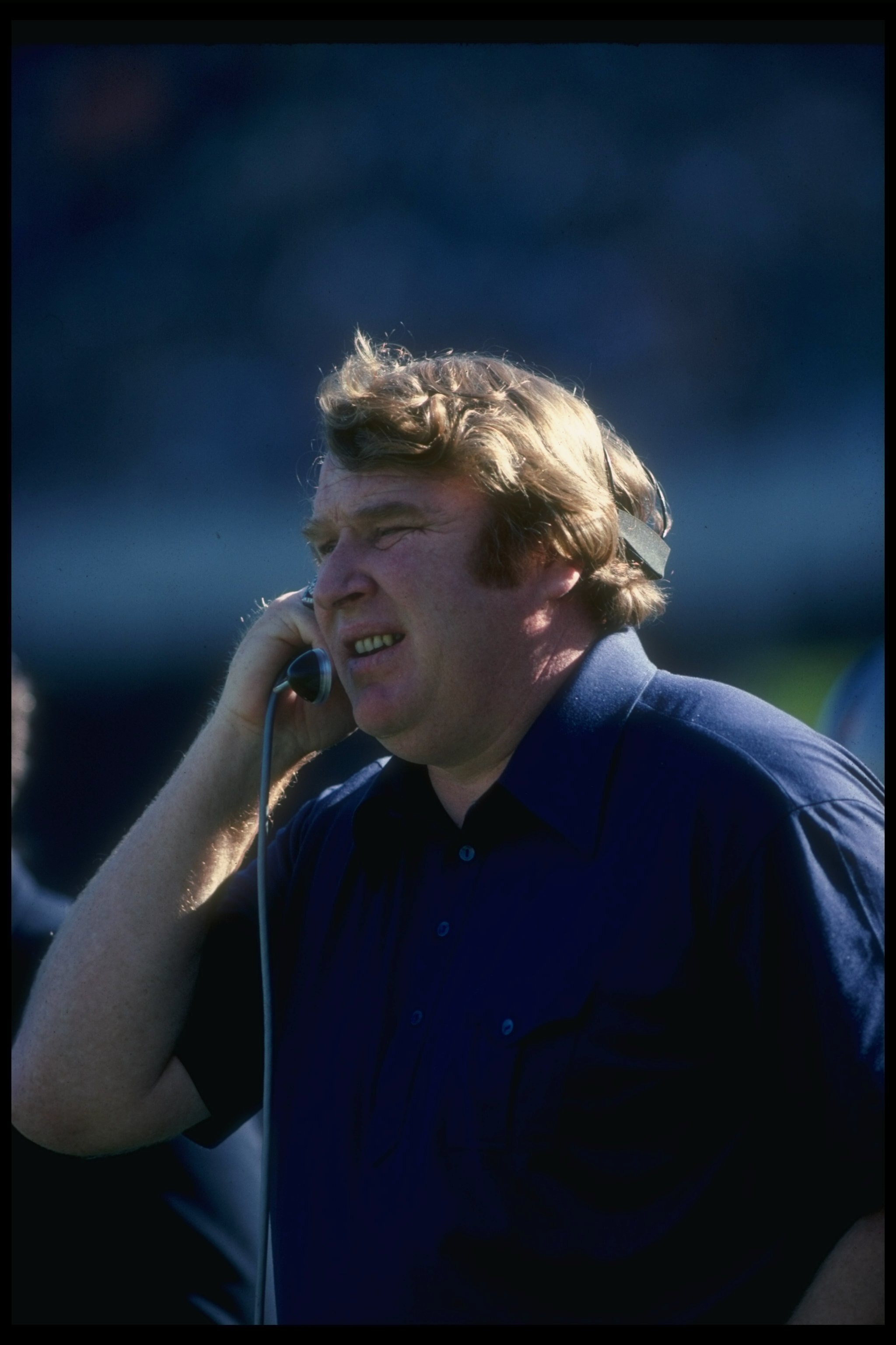 Oakland Raiders head coach John Madden looks on during a game. Oakland Raiders head coach John Madden looks on during a game.