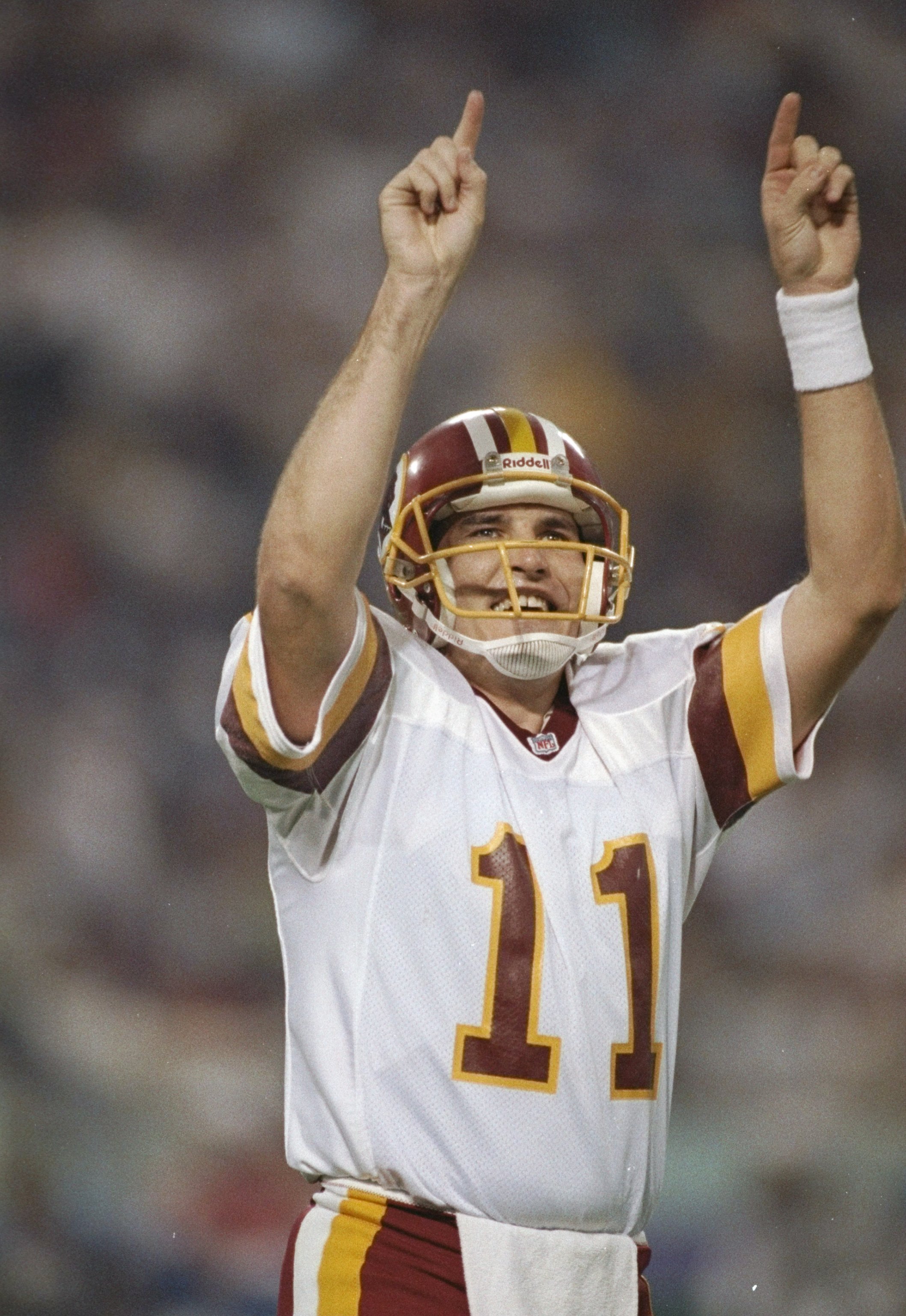 26 Jan 1992:  Quarterback Mark Rypien of the Washington Redskins celebrates during Super Bowl XXVI against the Buffalo Bills at the Hubert H. Humphrey Metrodome in Minneapolis, Minnesota.  The Reskins won the game, 37-24.  Rypien was named the game''s MVP
