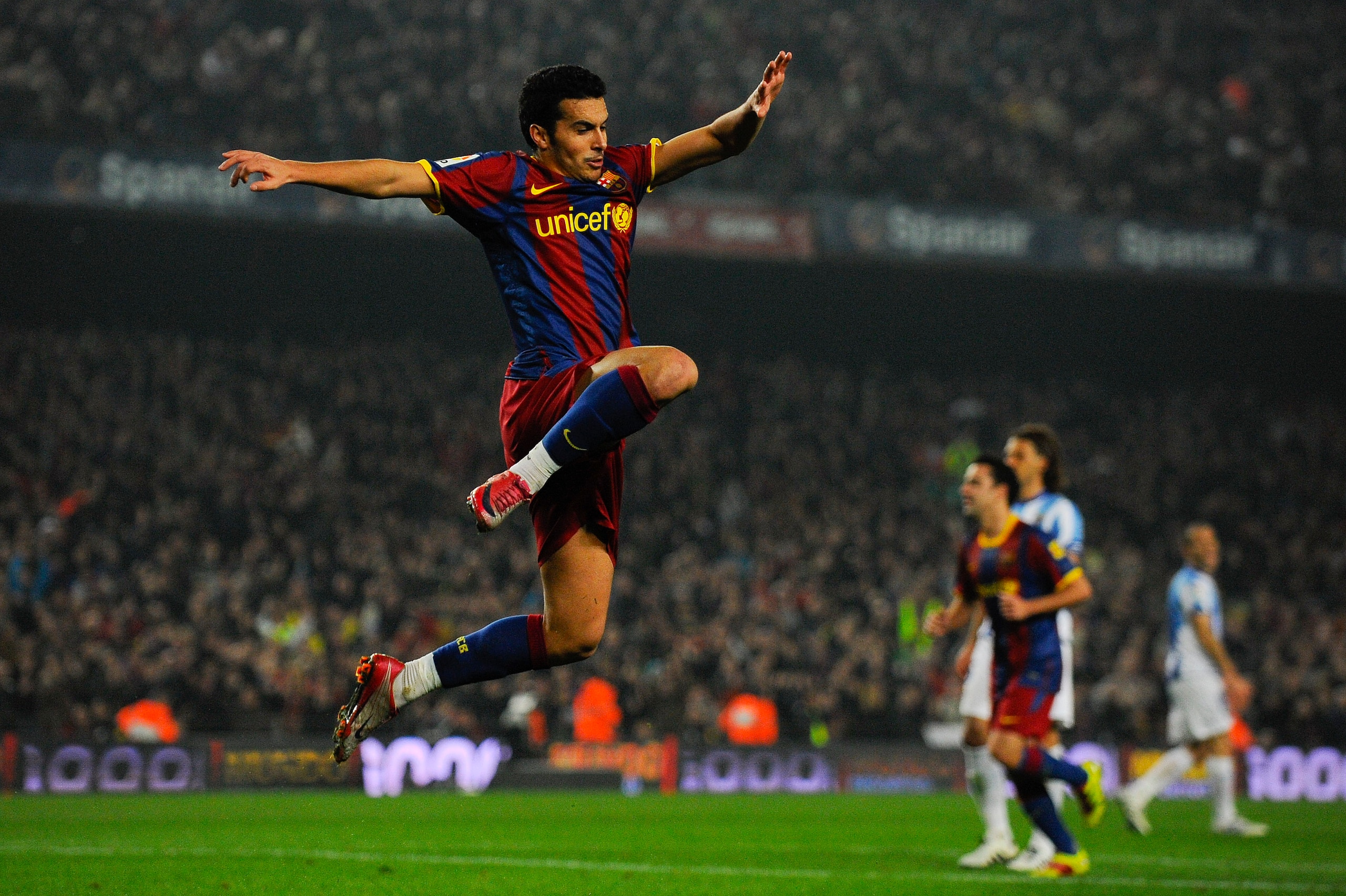 BARCELONA, SPAIN - JANUARY 16:  Pedro Rodriguez of FC Barcelona celebrates after scoring his side's third goal during the La Liga match between FC Barcelona and Malaga at Nou Camp on January 16, 2011 in Barcelona, Spain. Barcelona won 4-1.  (Photo by Davi