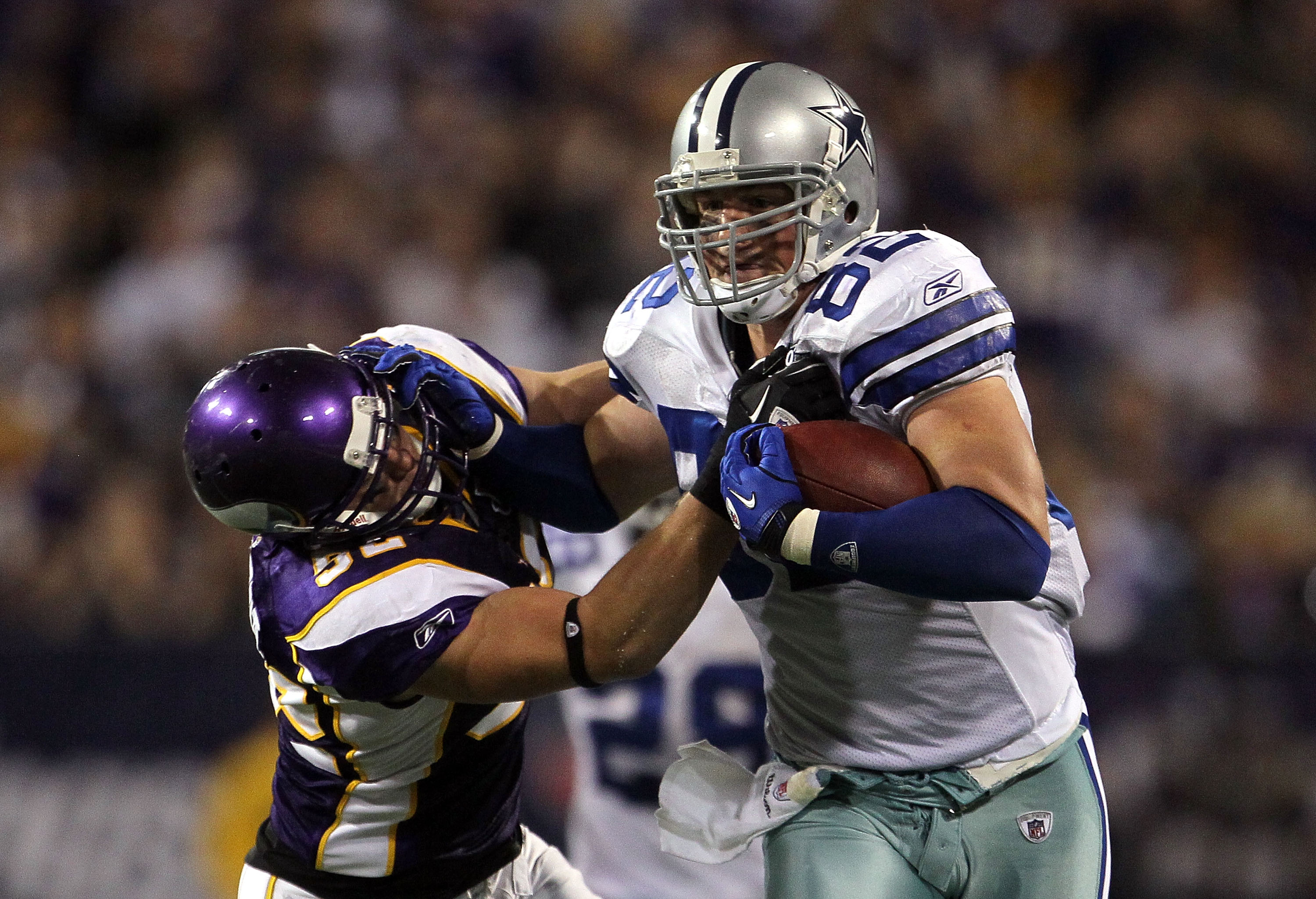 MINNEAPOLIS - OCTOBER 17:  Tight end Jason Witten #82 of the Dallas Cowboys tries to get away from Chad Greenway #52 of the Minnesota Vikings during the game at Mall of America Field on October 17, 2010 in Minneapolis, Minnesota. The Vikings defeated the