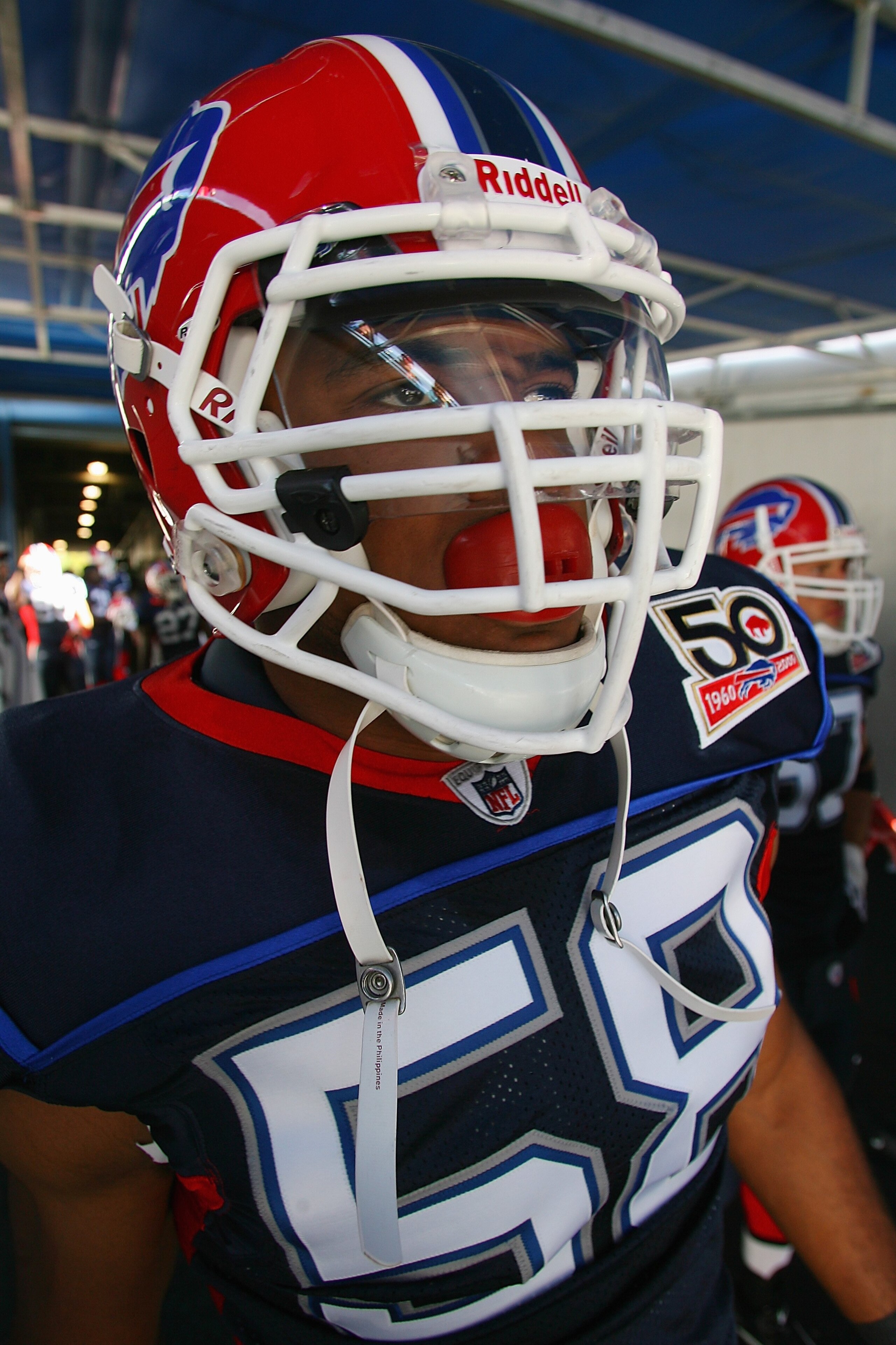 ORCHARD PARK, NY - SEPTEMBER 20:  Defensive end Aaron Maybin #58 of the Buffalo Bills gets ready to take the field prior to the game against the Tampa Bay Buccaneers at Ralph Wilson Stadium on September 20, 2009 in Orchard Park, New York.  The Bills won 3