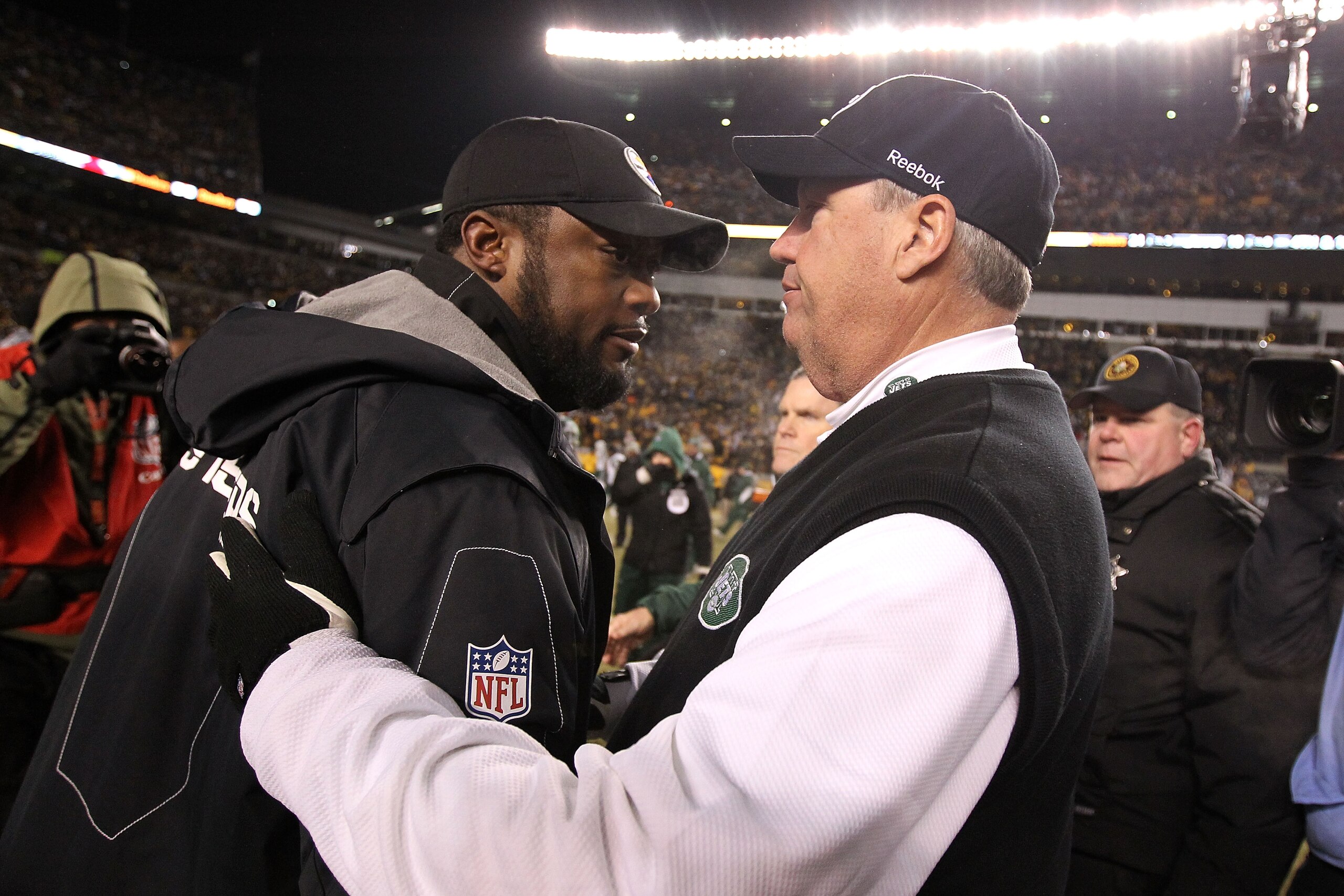 PITTSBURGH, PA - JANUARY 23: Head coach Mike Tomlin of the Pittsburgh Steelers and head coach Rex Ryan of the New York Jets shake hands after the Steelers defeated the Jets 24 to 19 in the 2011 AFC Championship game at Heinz Field on January 23, 2011 in PITTSBURGH, PA - JANUARY 23: Head coach Mike Tomlin of the Pittsburgh Steelers and head coach Rex Ryan of the New York Jets shake hands after the Steelers defeated the Jets 24 to 19 in the 2011 AFC Championship game at Heinz Field on January 23, 2011 in