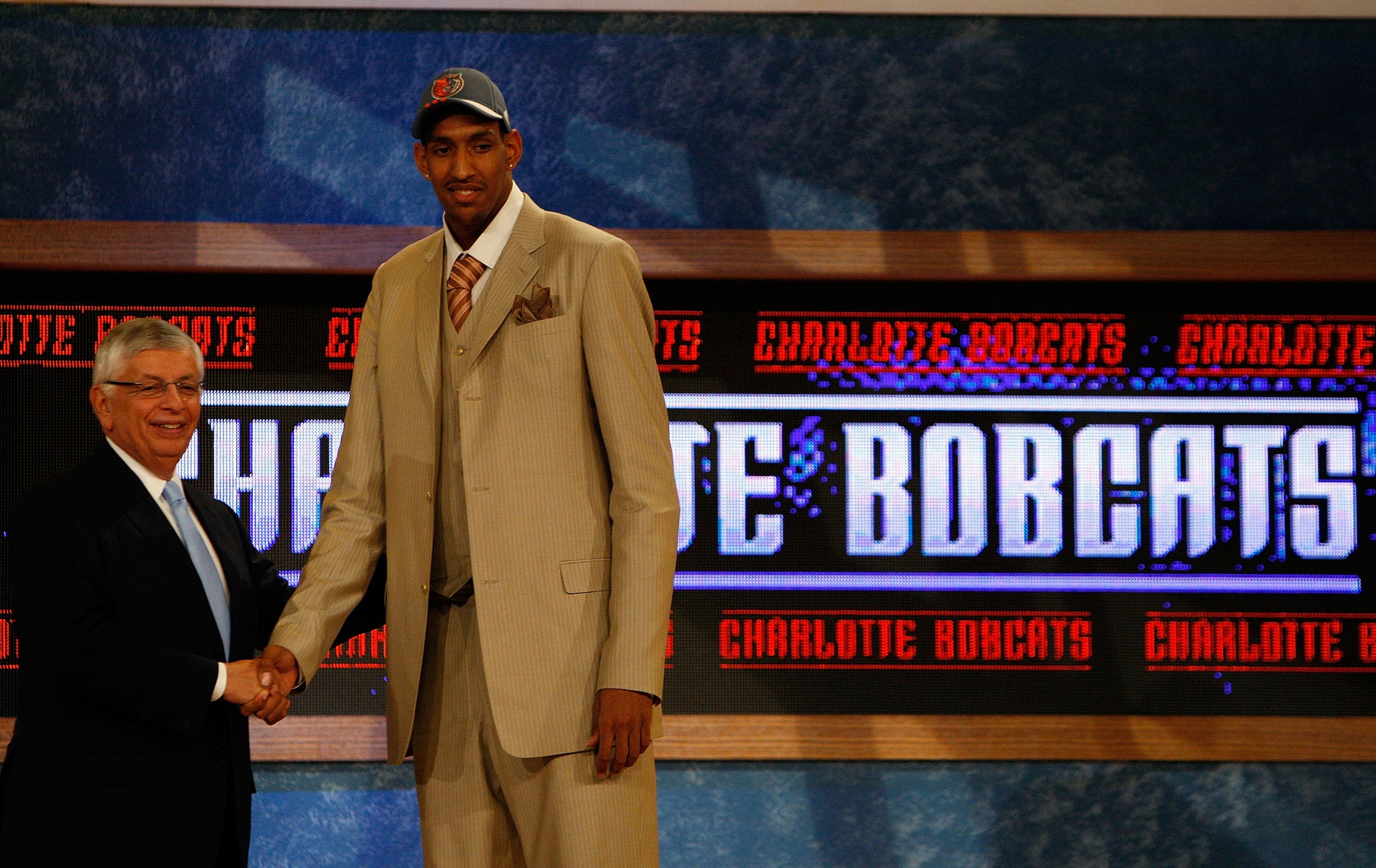 NEW YORK - JUNE 26:  NBA Commissioner David Stern shakes hands with number twenty draft pick for the Charlotte Bobcats, Alexis Ajinca during the 2008 NBA Draft at the Wamu Theatre at Madison Square Garden June 26, 2008 in New York City. NOTE TO USER: User