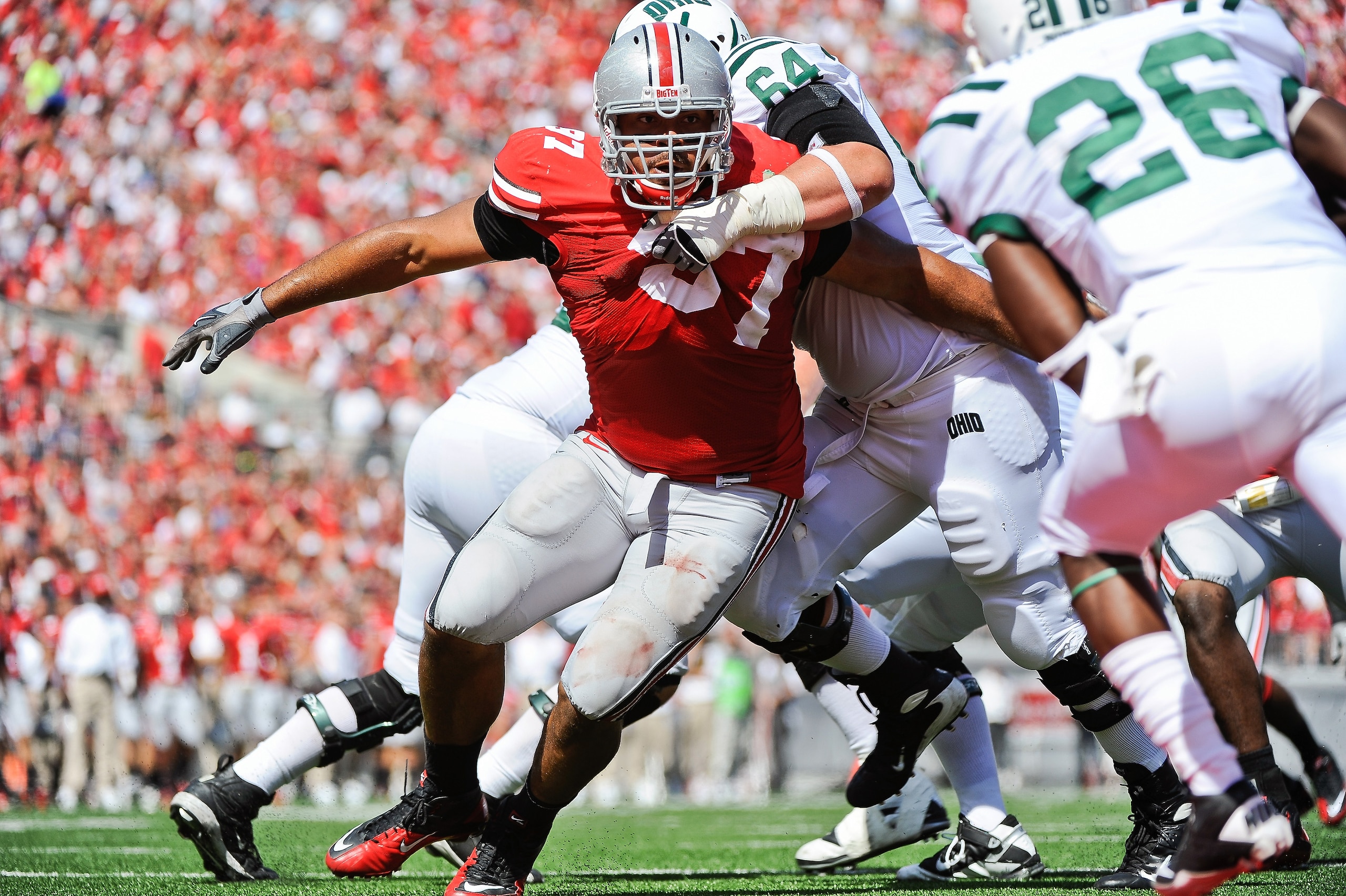 COLUMBUS, OH - SEPTEMBER 18:  Cameron Heyward #97 of the Ohio State Buckeyes chases after the ballcarrier against the Ohio Bobcats at Ohio Stadium on September 18, 2010 in Columbus, Ohio.  (Photo by Jamie Sabau/Getty Images)