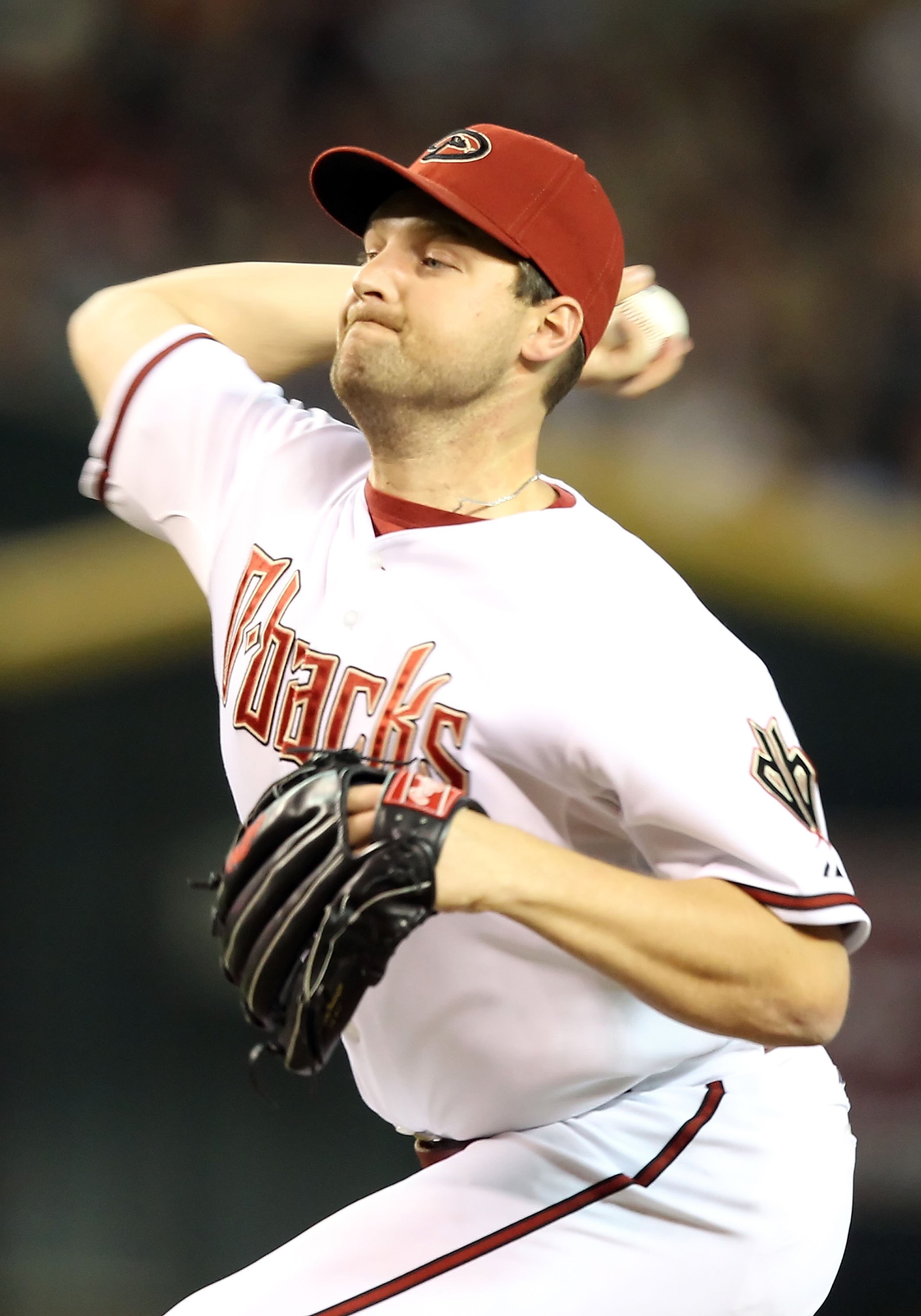 PHOENIX - MAY 20:  Relief pitcher Aaron Heilman #22 of the Arizona Diamondbacks pitches against the San Francisco Giants during the Major League Baseball game at Chase Field on May 20, 2010 in Phoenix, Arizona. The Diamondbacks defeated the Giants 8-7.  (
