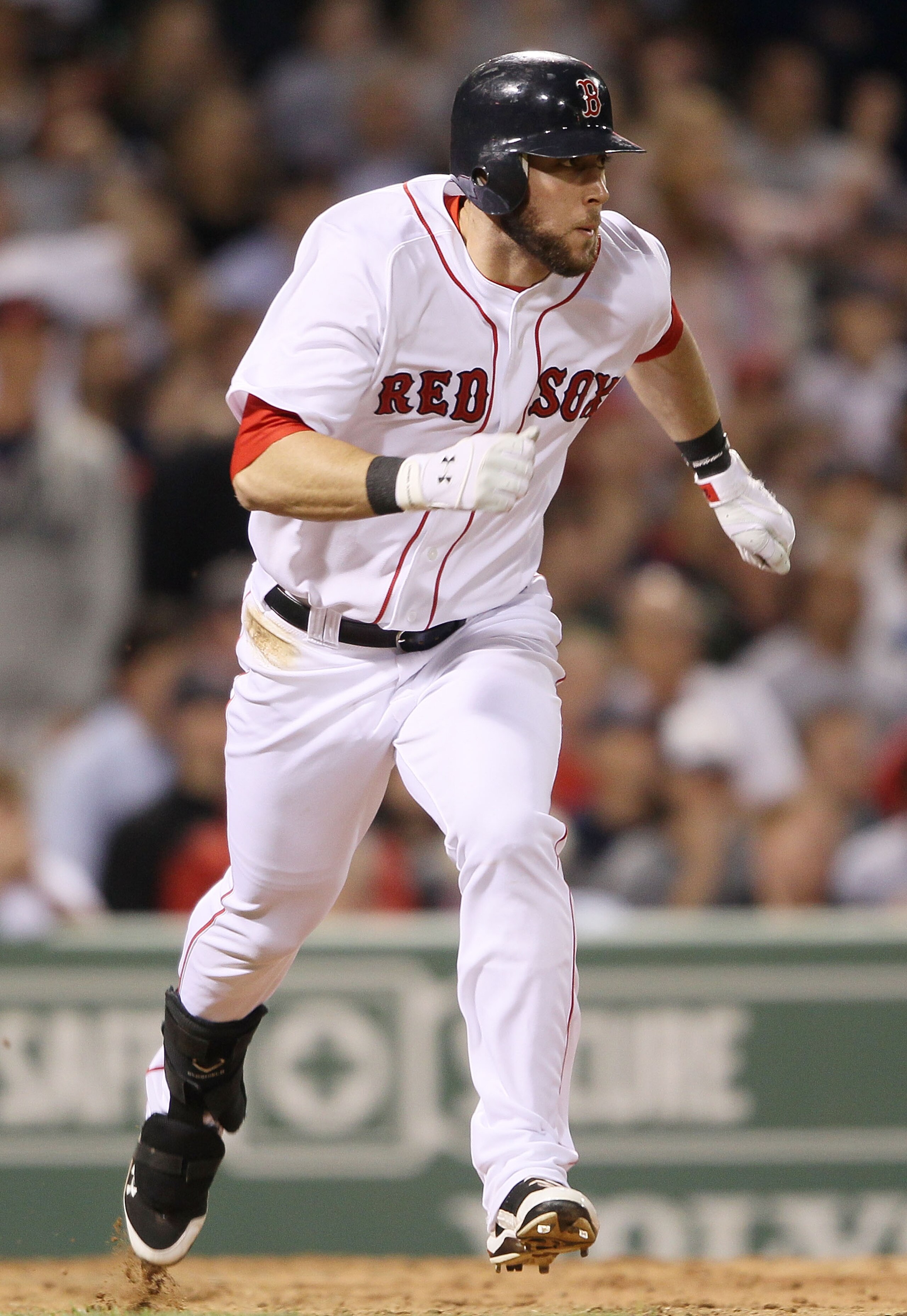 BOSTON - MAY 06:  Jeremy Hermida #32 of the Boston Red Sox heads for first base after he hit a 2RBI in the fifth inning against the Los Angeles Angels of Anaheim defends on May 6, 2010 at Fenway Park in Boston, Massachusetts.  (Photo by Elsa/Getty Images)