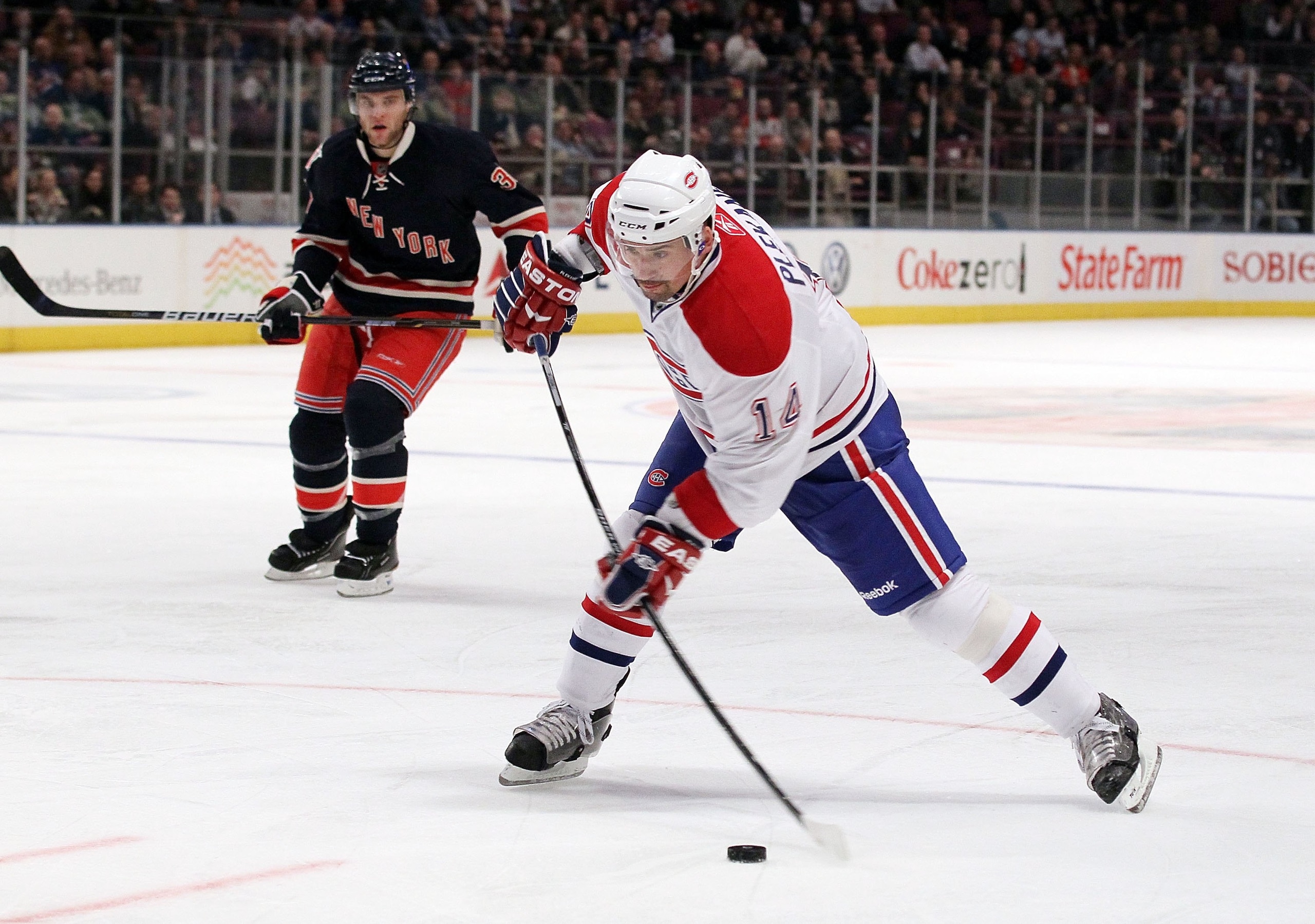 NEW YORK, NY - JANUARY 11: Tomas Plekanec #14 of the Montreal Canadiens skates against the New York Rangers on January 11, 2011 at Madison Square Garden in New York City. Montreal defeated the Rangers 2-1. (Photo by Jim McIsaac/Getty Images) NEW YORK, NY - JANUARY 11: Tomas Plekanec #14 of the Montreal Canadiens skates against the New York Rangers on January 11, 2011 at Madison Square Garden in New York City. Montreal defeated the Rangers 2-1. (Photo by Jim McIsaac/Getty Images)