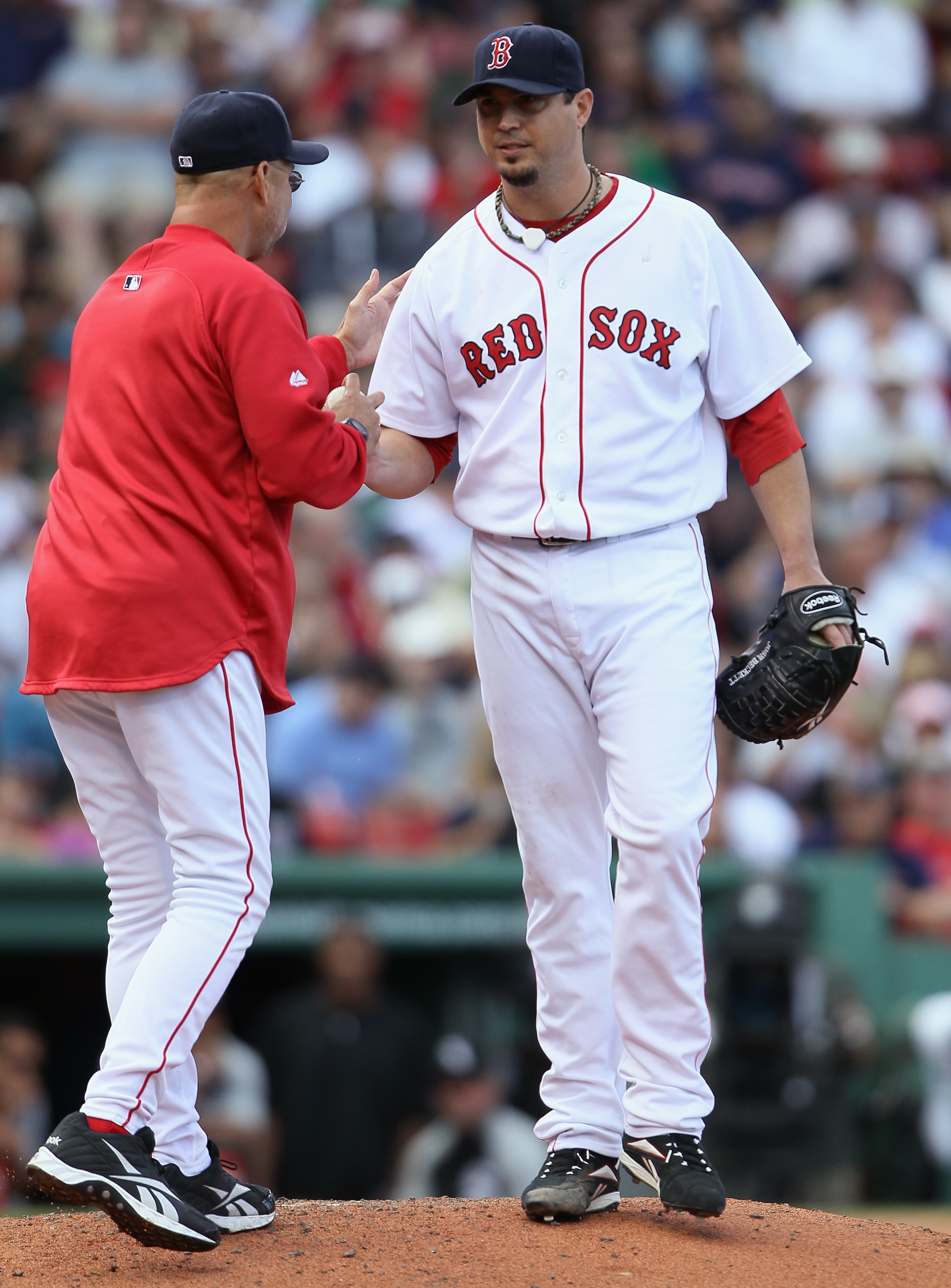 BOSTON - SEPTEMBER 05: Manager Terry Francona #47 of the Boston Red Sox pulls Josh Beckett #19 ouf of the game in the seventh inning against the Chicago White Sox on September 5, 2010 at Fenway Park in Boston, Massachusetts. (Photo by Elsa/Getty Images) BOSTON - SEPTEMBER 05: Manager Terry Francona #47 of the Boston Red Sox pulls Josh Beckett #19 ouf of the game in the seventh inning against the Chicago White Sox on September 5, 2010 at Fenway Park in Boston, Massachusetts. (Photo by Elsa/Getty Images)