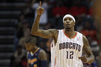 CHARLOTTE, NC - DECEMBER 07:  Tyrus Thomas #12 of the Charlotte Bobcats reacts to scoring against the Denver Nuggets during their game at Time Warner Cable Arena on December 7, 2010 in Charlotte, North Carolina.  NOTE TO USER: User expressly acknowledges