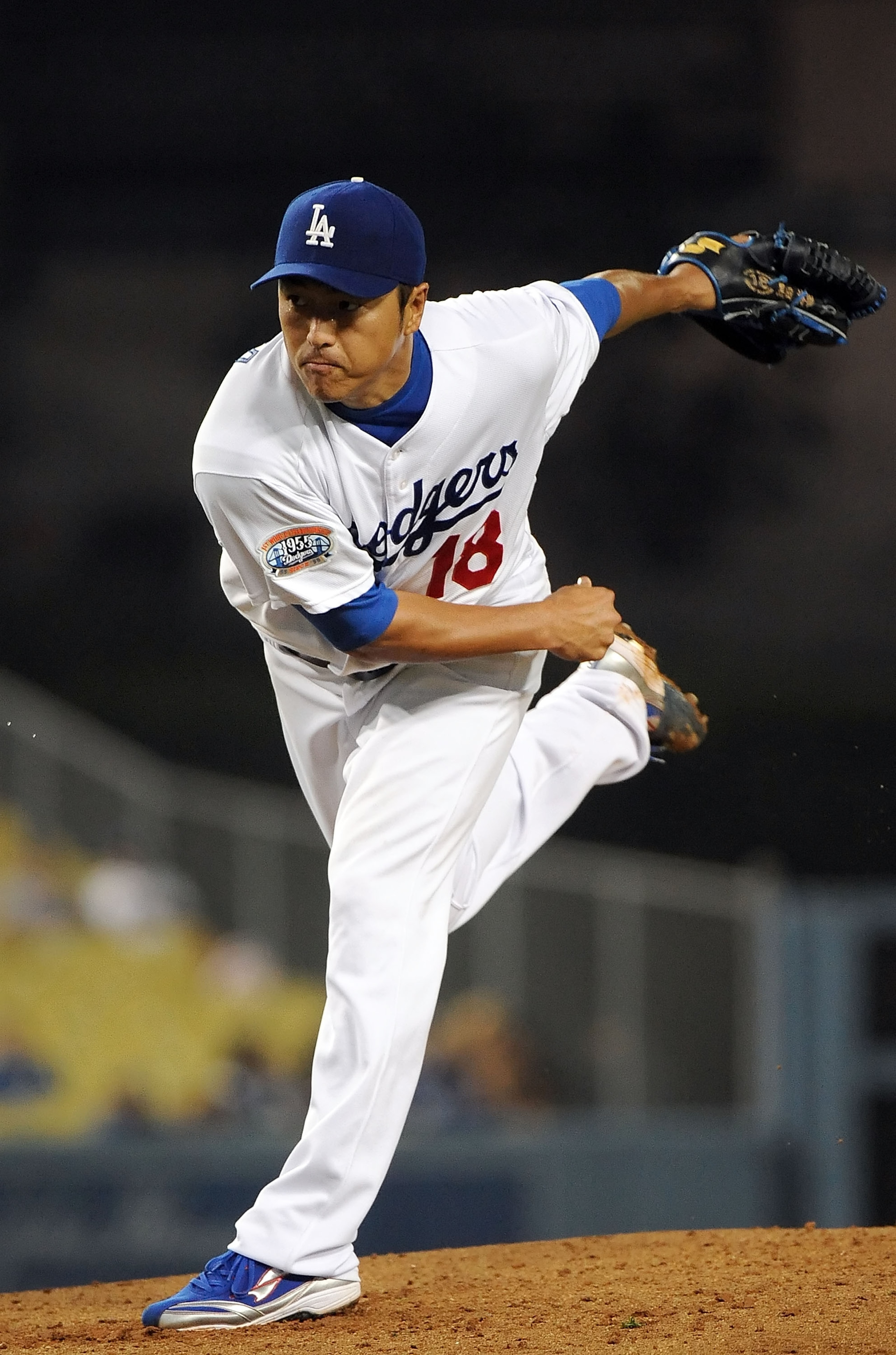 LOS ANGELES, CA - SEPTEMBER 17:  Hiroki Kuroda #18 of the Los Angeles Dodgers pitches against the Colorado Rockies at Dodger Stadium on September 17, 2010 in Los Angeles, California.  (Photo by Lisa Blumenfeld/Getty Images)