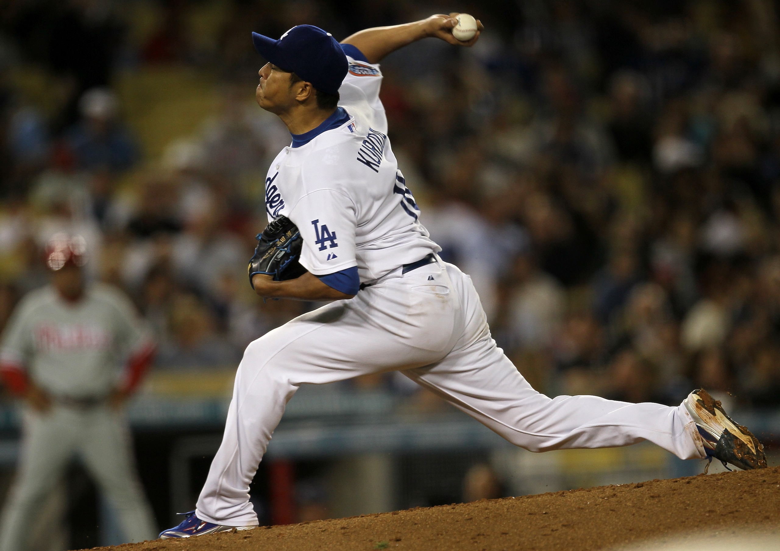 LOS ANGELES, CA - AUGUST 30:  Hiroki Kuroda #18 of the Los Angeles Dodgers throws a pitch against the Philadelphia Phillies on August 30, 2010 at Dodger Stadium  in Los Angeles, California.  (Photo by Stephen Dunn/Getty Images)