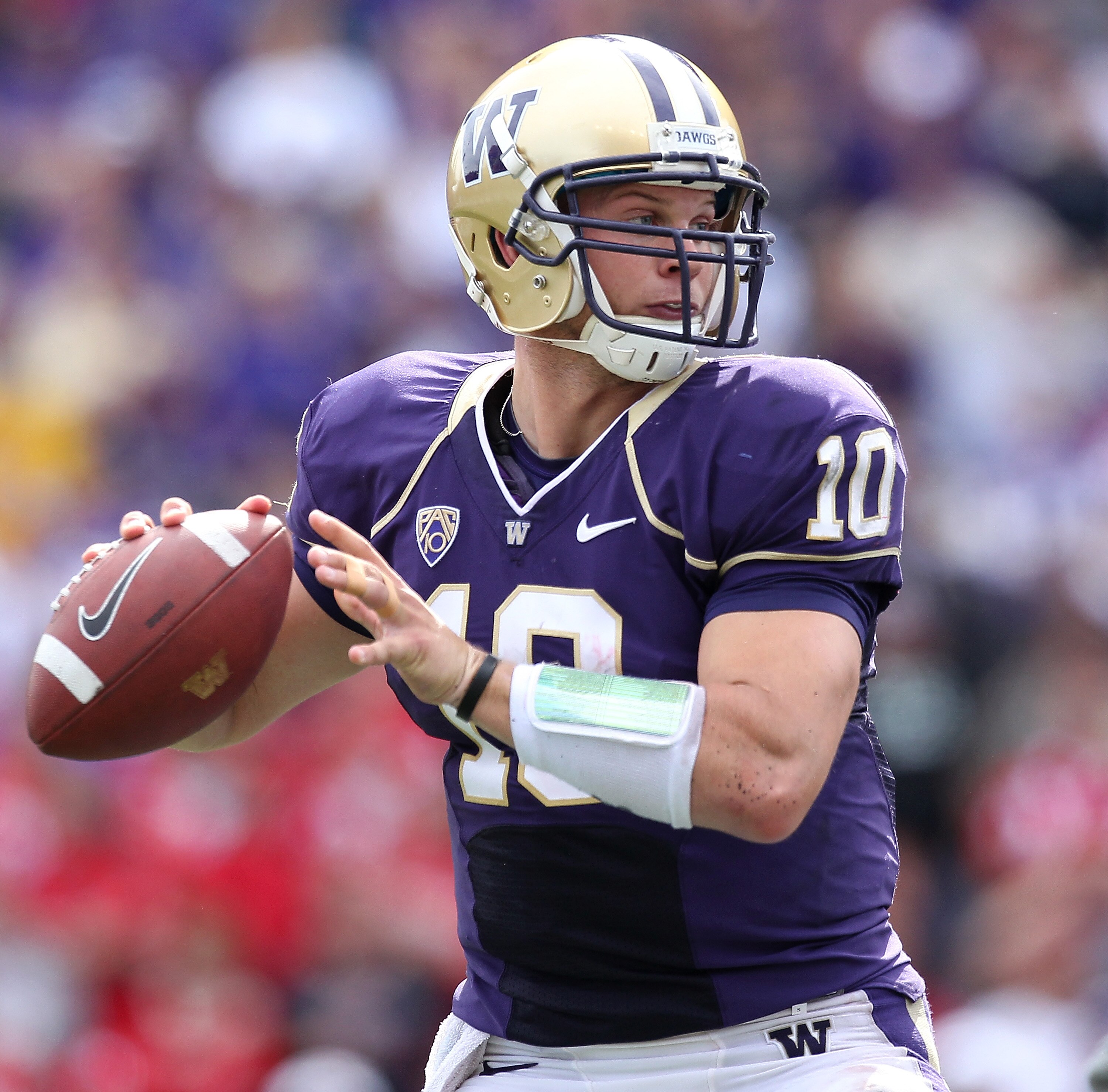 SEATTLE - SEPTEMBER 18:  Quarterback Jake Locker #10 of the Washington Huskies passes against the Nebraska Cornhuskers on September 18, 2010 at Husky Stadium in Seattle, Washington. The Cornhuskers defeated the Huskies 56-21. (Photo by Otto Greule Jr/Gett