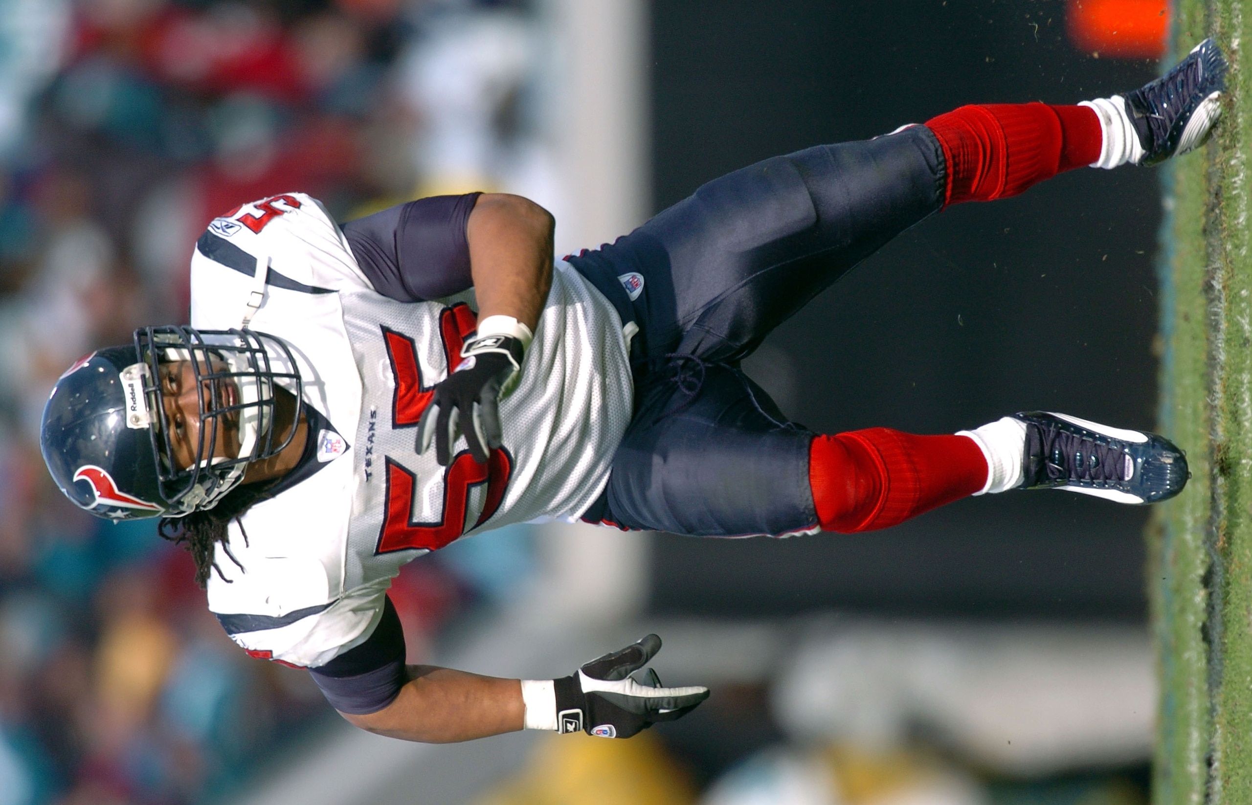 JACKSONVILLE, FL - DECEMBER 26:  Jamie Sharper #55 of the Houston Texans defends against the Jacksonville Jaguars at ALLTEL Stadium December 26, 2004 in Jacksonville, Florida. Houston won 21-0. (Photo by Larry French/Getty Images)