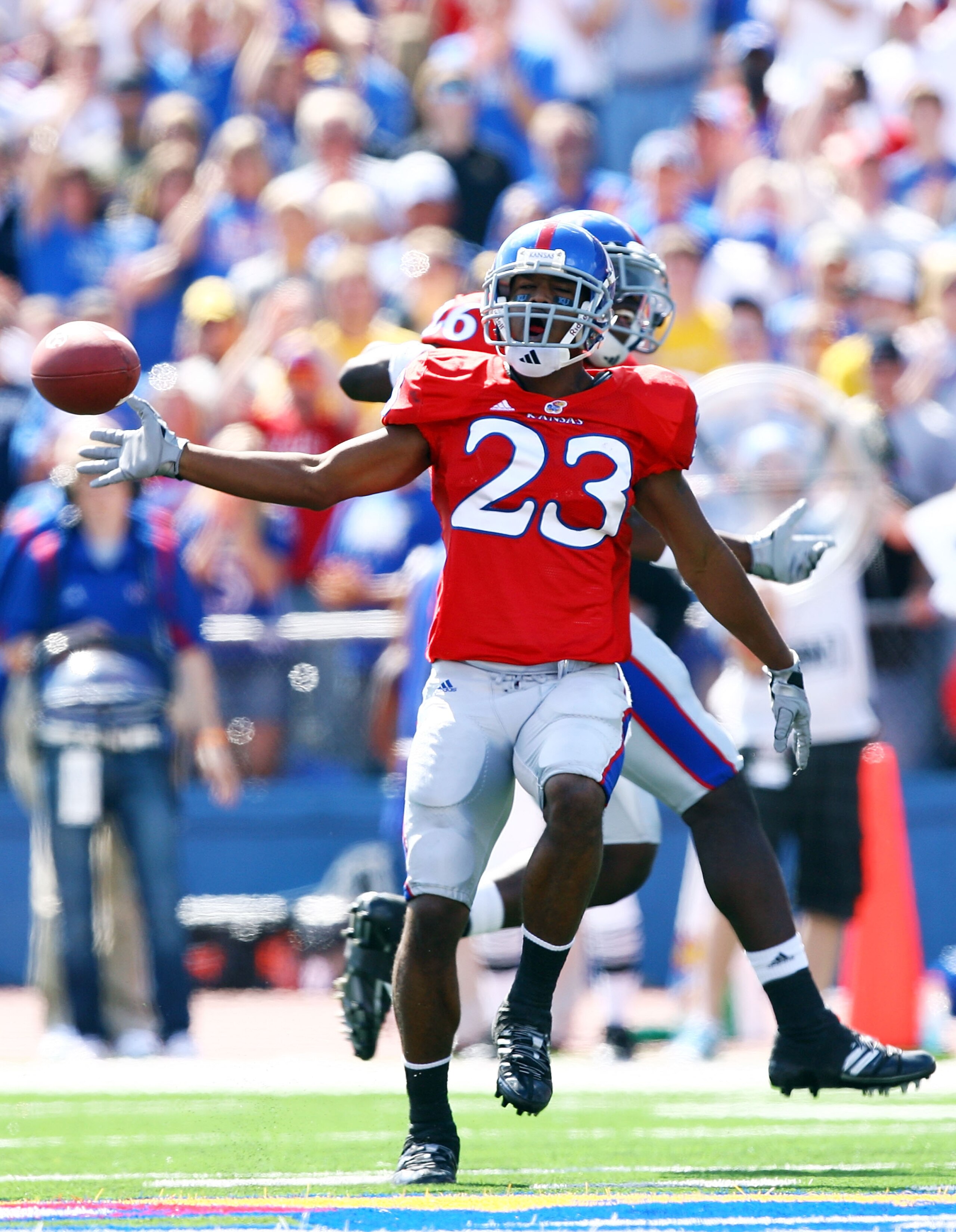 LAWRENCE, KS - SEPTEMBER 26:  Ryan Murphy #23 of the Kansas Jayhawks reacts after making an interception during the game against the Southern Mississippi Golden Eagles on September 26, 2009 at Memorial Stadium in Lawrence, Kansas.  (Photo by Jamie Squire/