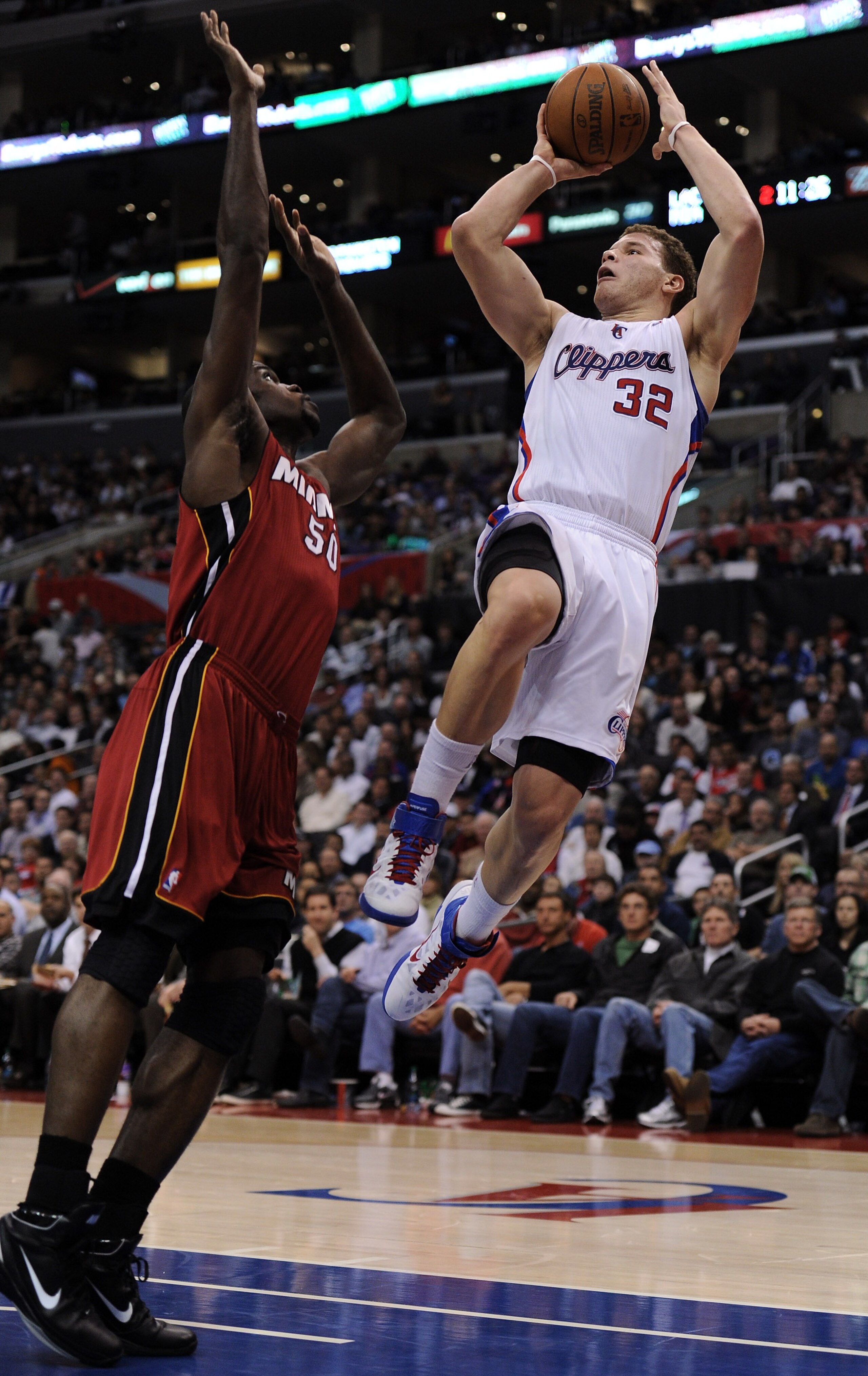 LOS ANGELES, CA - JANUARY 12:  Blake Griffin #32 of the Los Angeles Clippers scores on a fadeaway jumper past Joel Anthony #50 of the Miami Heat at Staples Center on January 12, 2011 in Los Angeles, California.  NOTE TO USER: User expressly acknowledges a