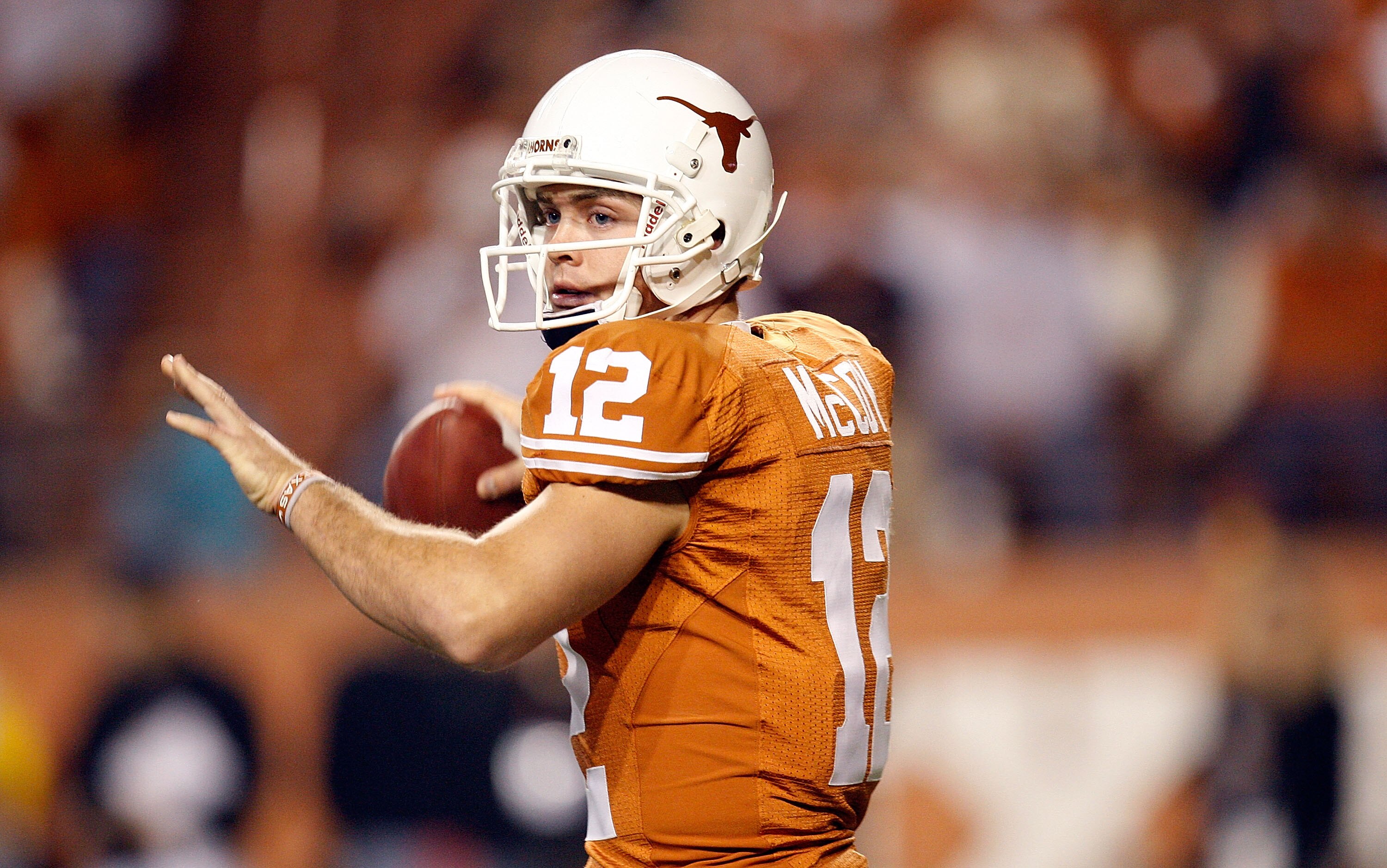 AUSTIN, TX - NOVEMBER 21:  Quarterback Colt McCoy #12 of the Texas Longhorns drops back to pass against the Kansas Jayhawks at Darrell K Royal-Texas Memorial Stadium on November 21, 2009 in Austin, Texas.  (Photo by Ronald Martinez/Getty Images)
