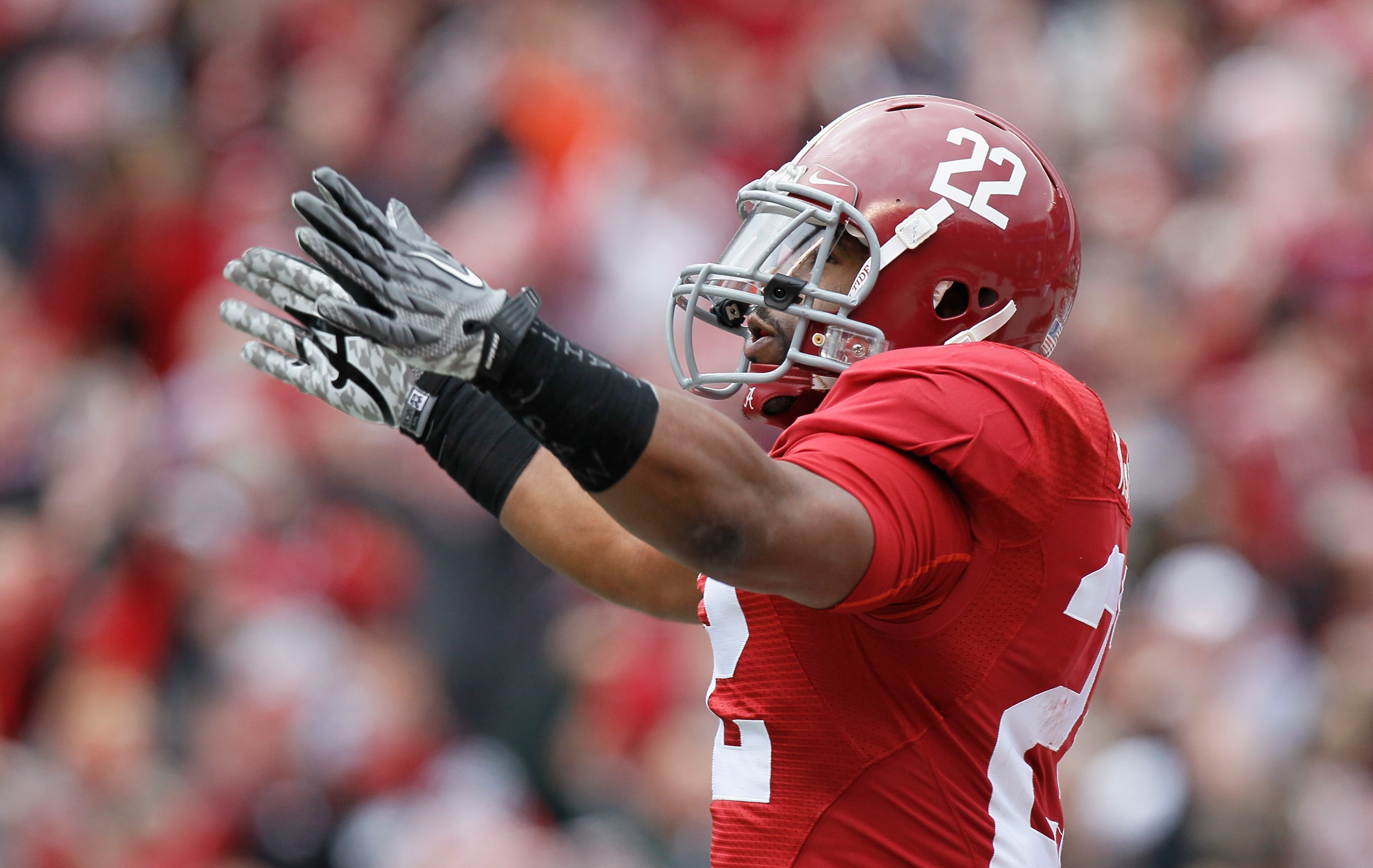 TUSCALOOSA, AL - NOVEMBER 26:  Mark Ingram #22 of the Alabama Crimson Tide reacts after rushing for a touchdown against the Auburn Tigers at Bryant-Denny Stadium on November 26, 2010 in Tuscaloosa, Alabama.  (Photo by Kevin C. Cox/Getty Images)
