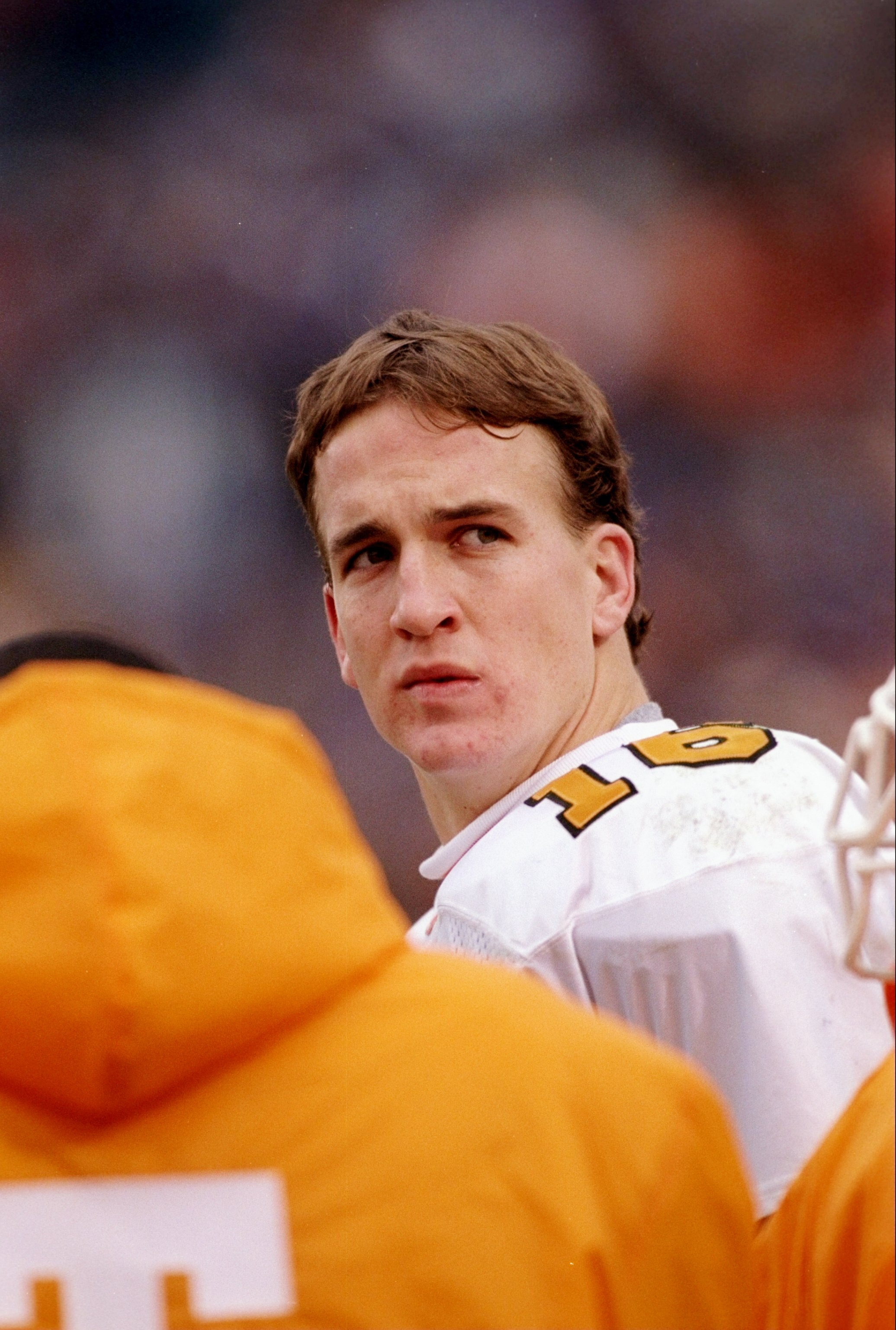 23 Nov 1997:  Quarterback Peyton Manning of the Tennessee Volunteers stands on the sidelines during a game against the Kentucky Wildcats at Commonwealth Stadium in Lexington, Kentucky.  Tennessee won the game 59-31. Mandatory Credit: Rick Stewart  /Allspo