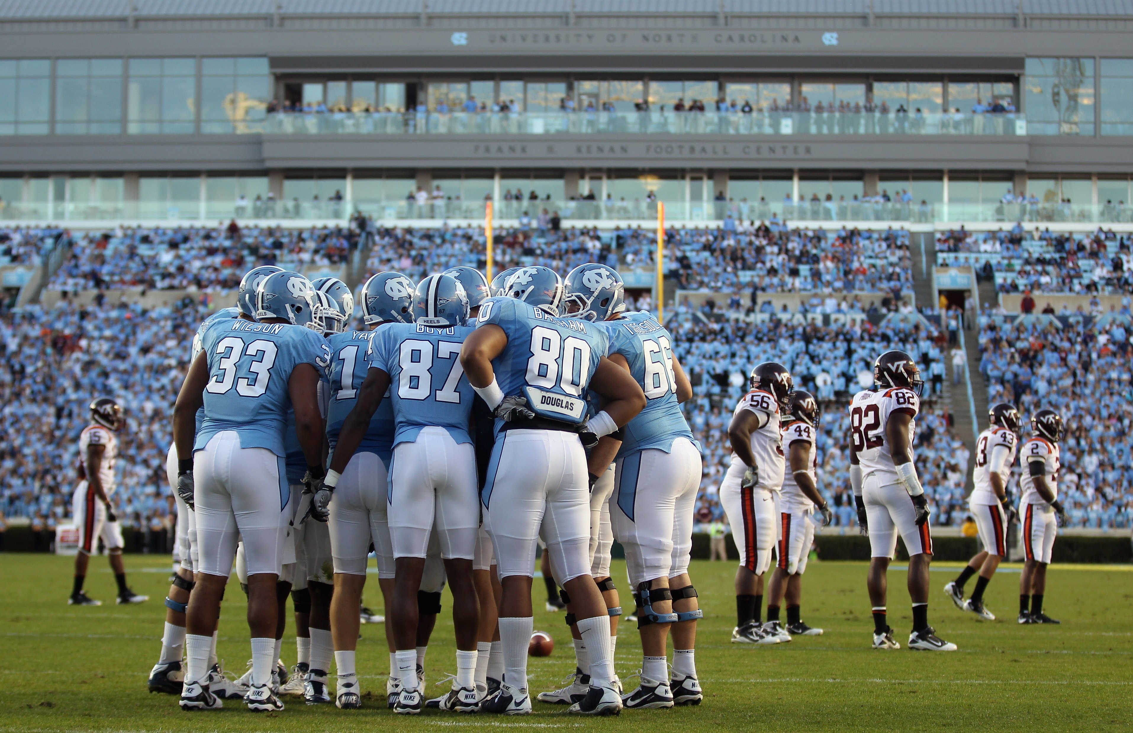 CHAPEL HILL, NC - NOVEMBER 13:  The North Carolina Tar Heels huddle against the Virginia Tech Hokies during their game at Kenan Stadium on November 13, 2010 in Chapel Hill, North Carolina.  (Photo by Streeter Lecka/Getty Images)